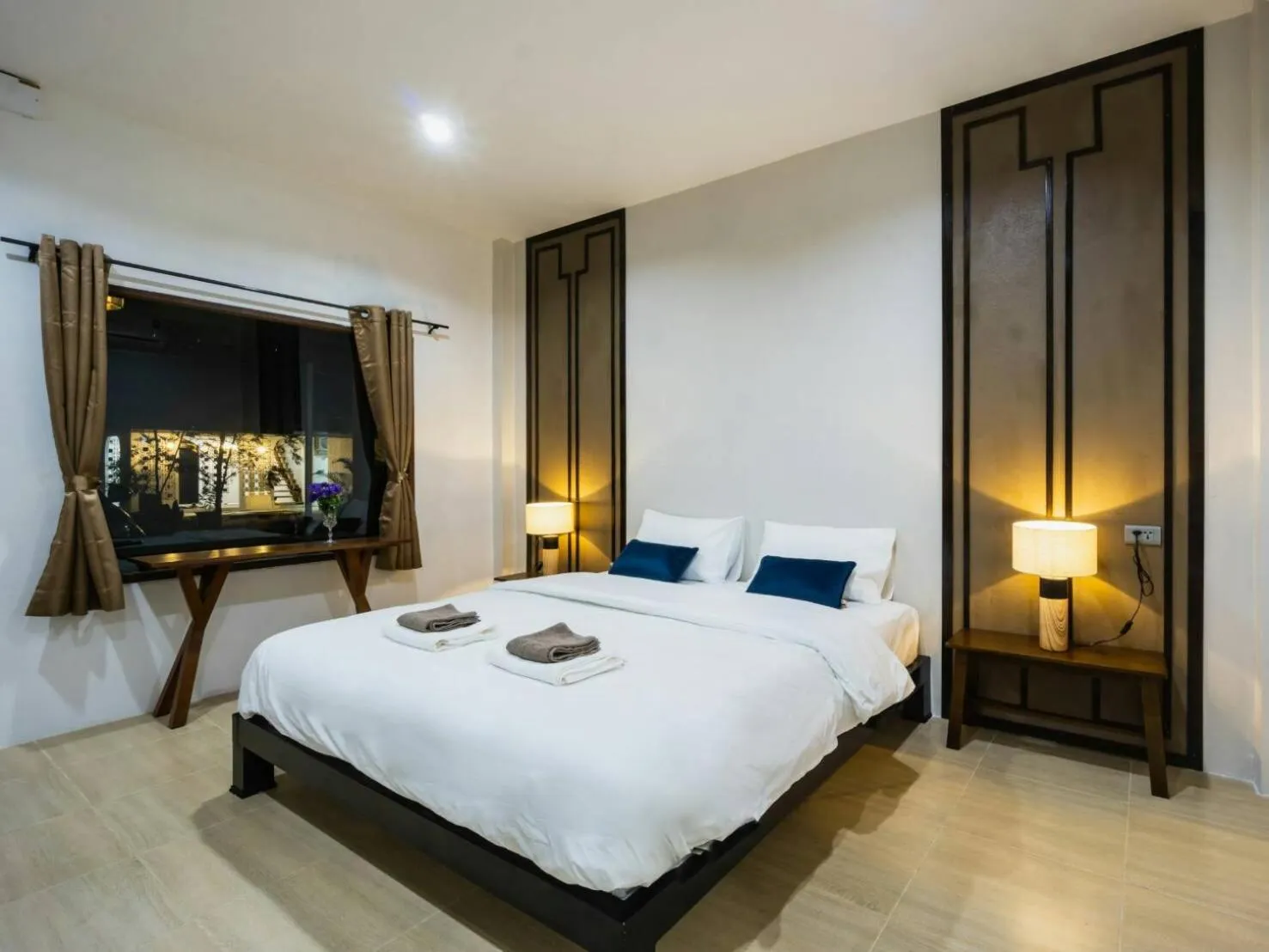 Bed in Nararin Garden House