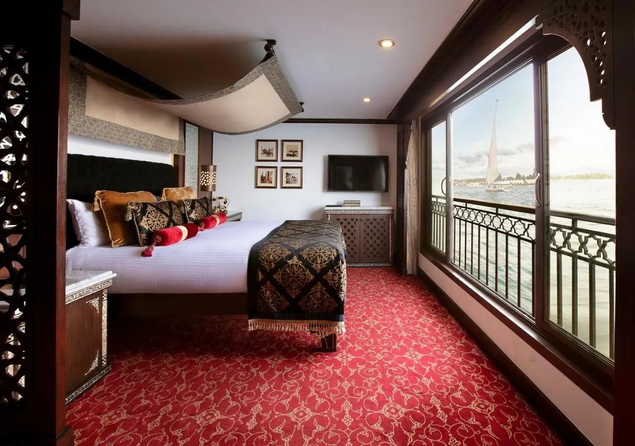 Living room, Bed in Dahabeya Yakouta Nile Cruise-Every Monday from Luxor- Aswan for 05 nights