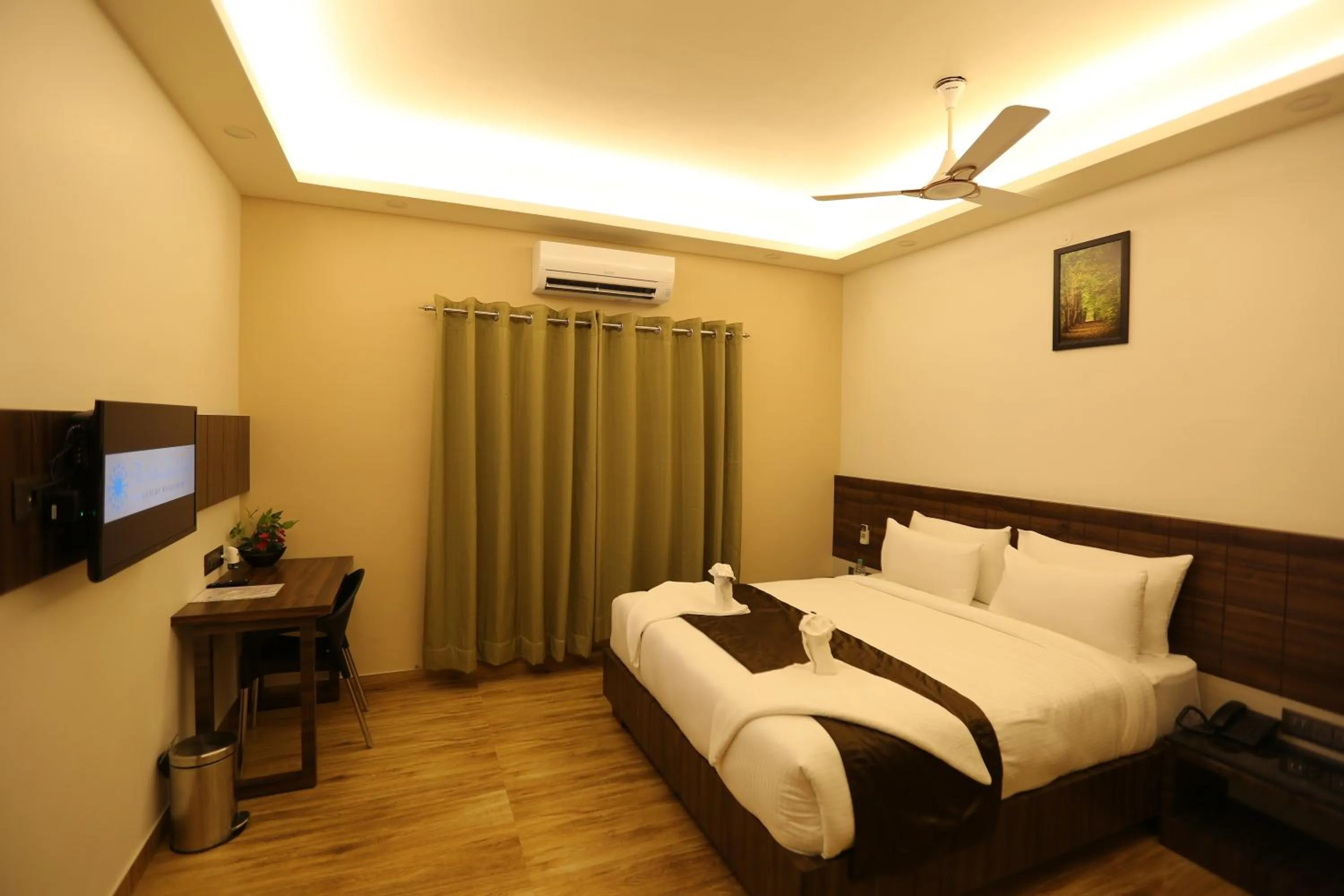 Bed in The Ventura Grand Hotel