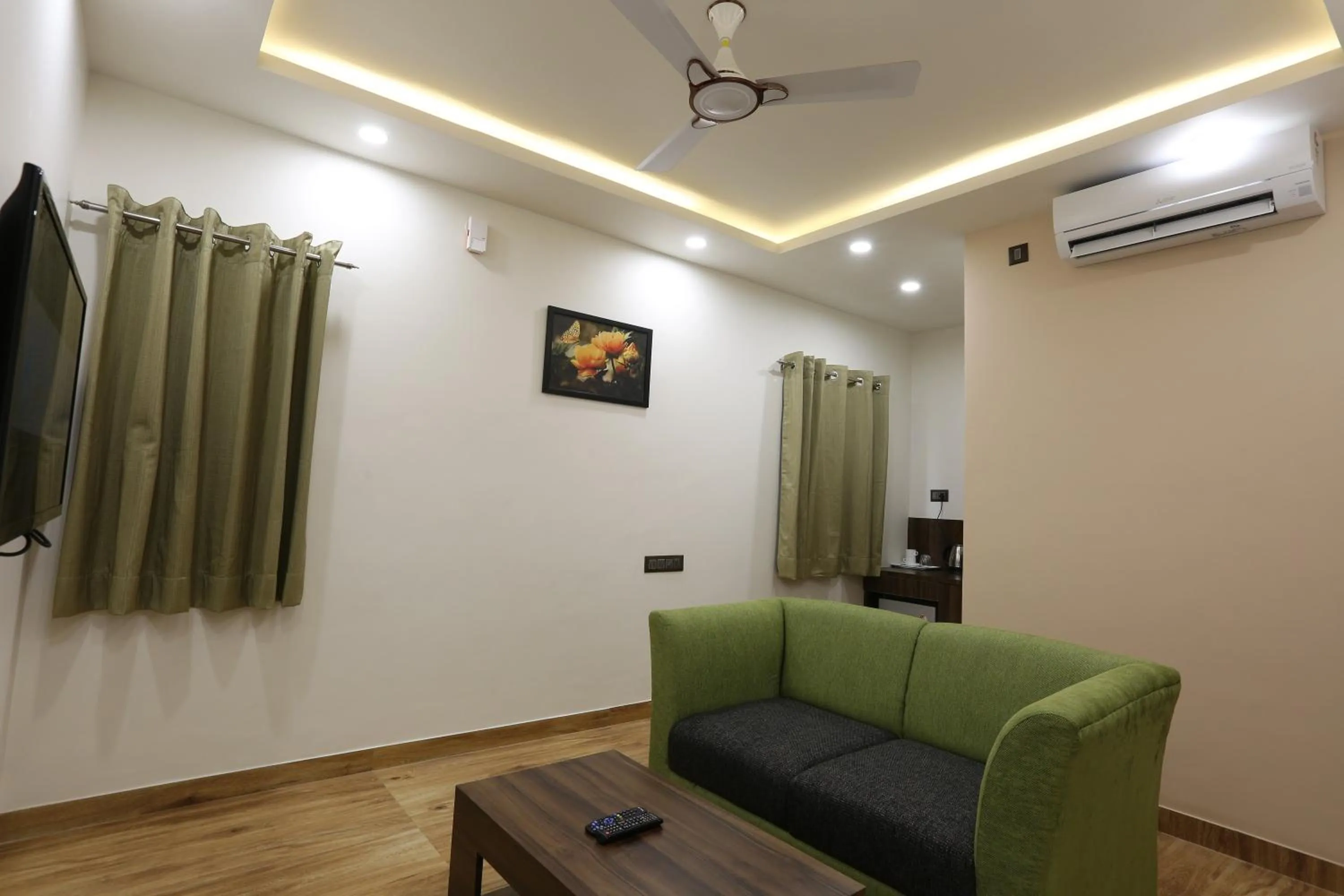 Communal lounge/ TV room in The Ventura Grand Hotel