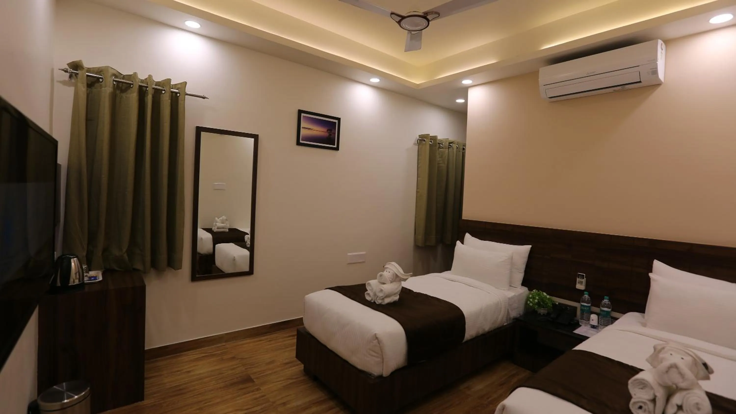 Bed in The Ventura Grand Hotel