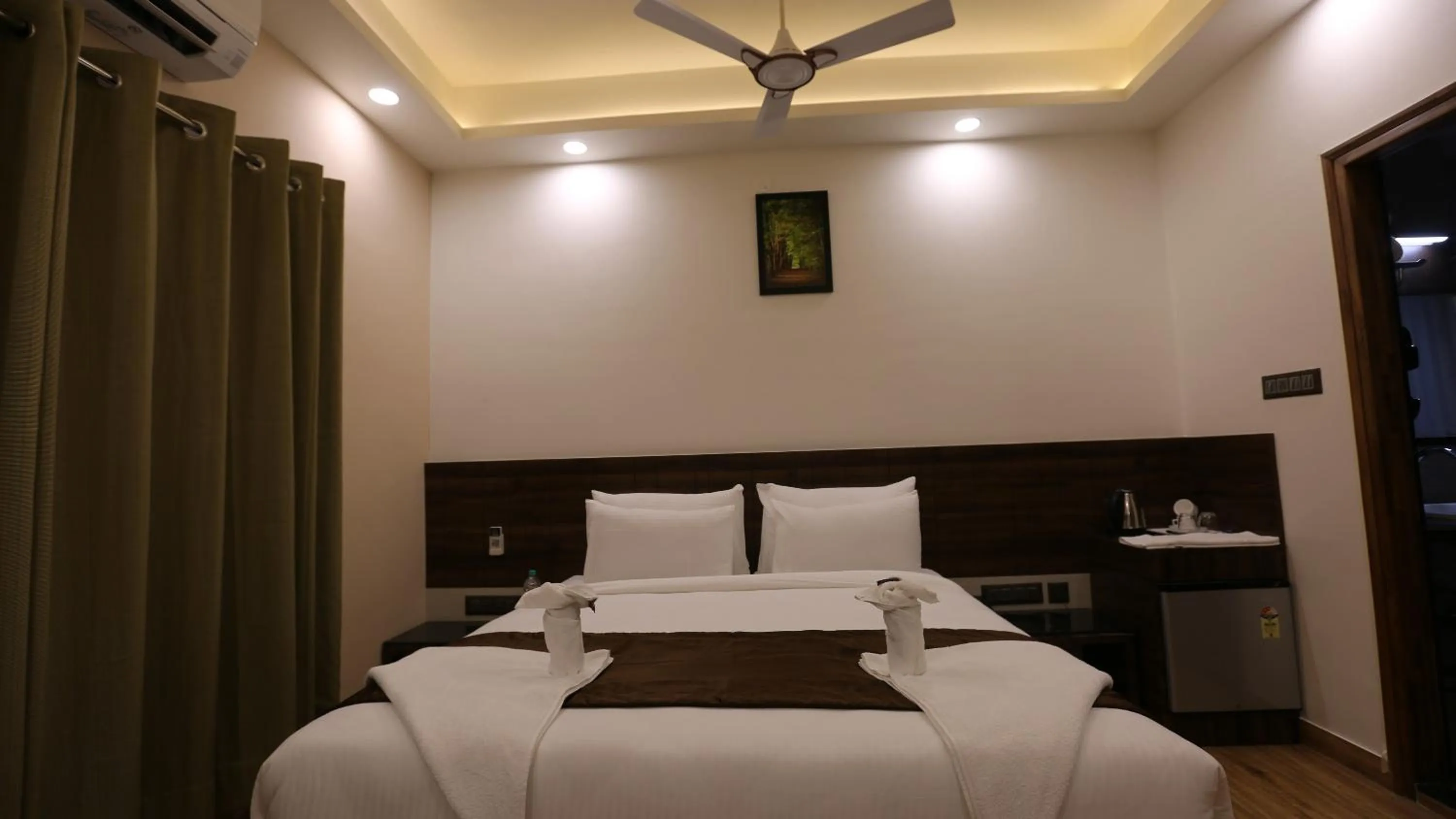 Bed in The Ventura Grand Hotel