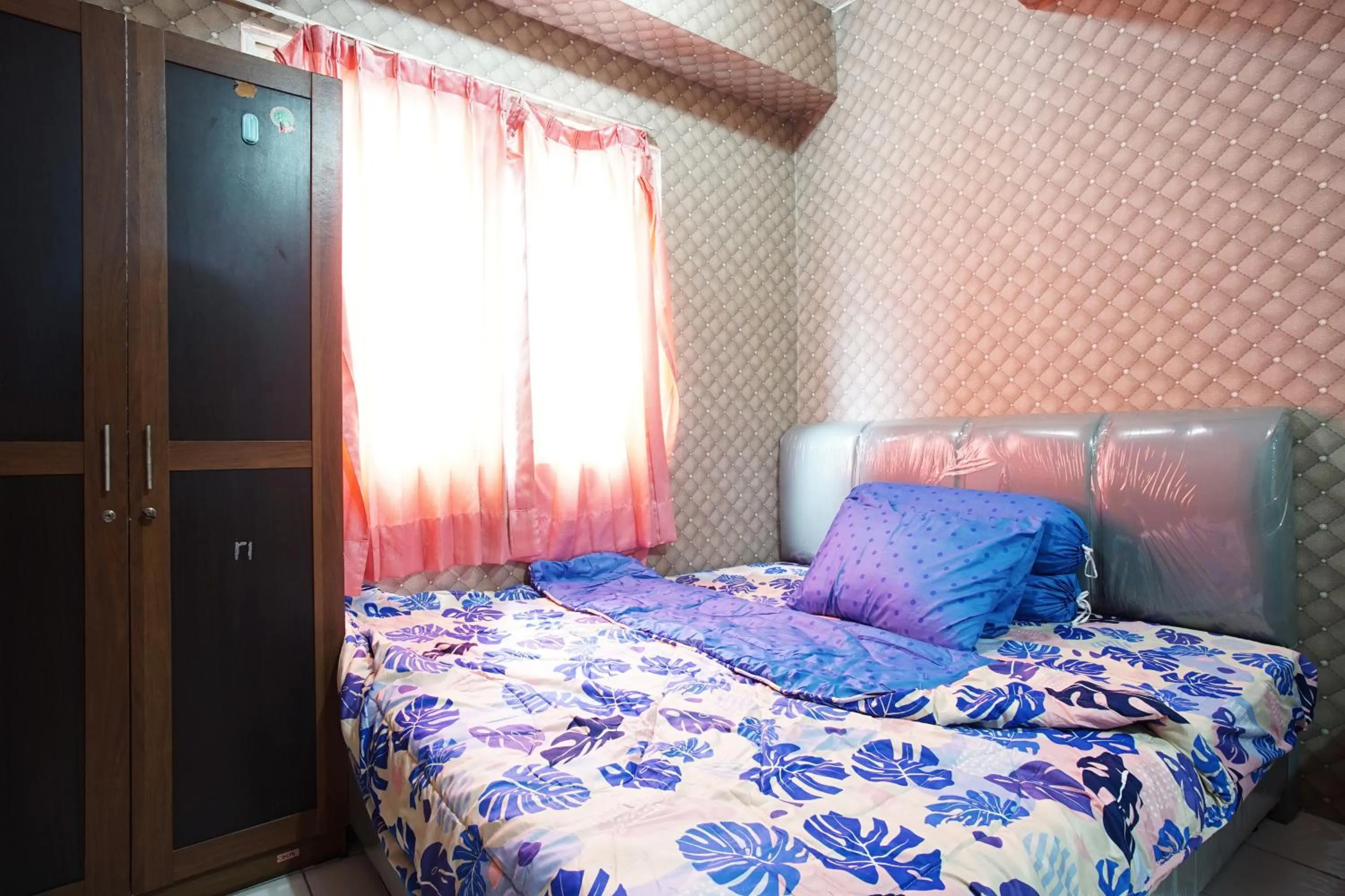 Bed in City Park Apartment by Anita