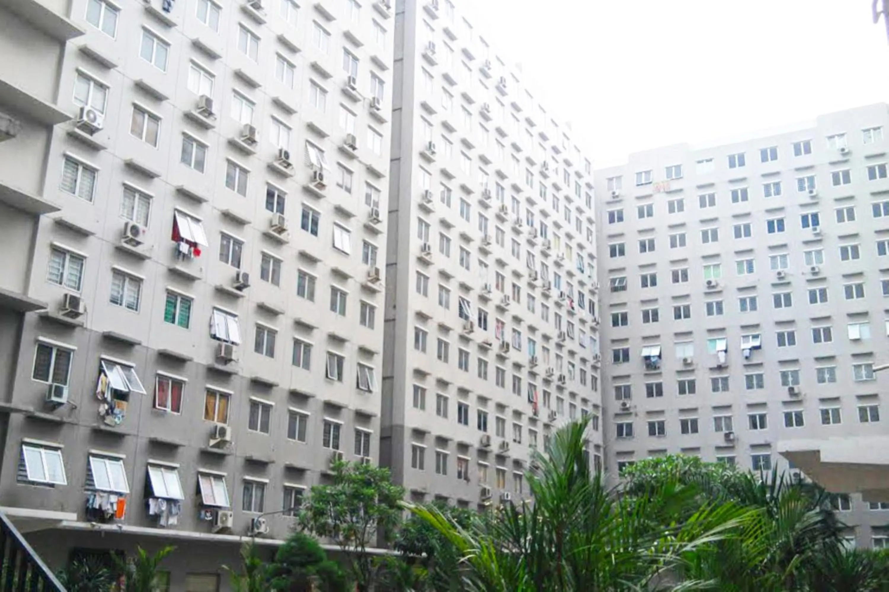 Property building in City Park Apartment by Anita