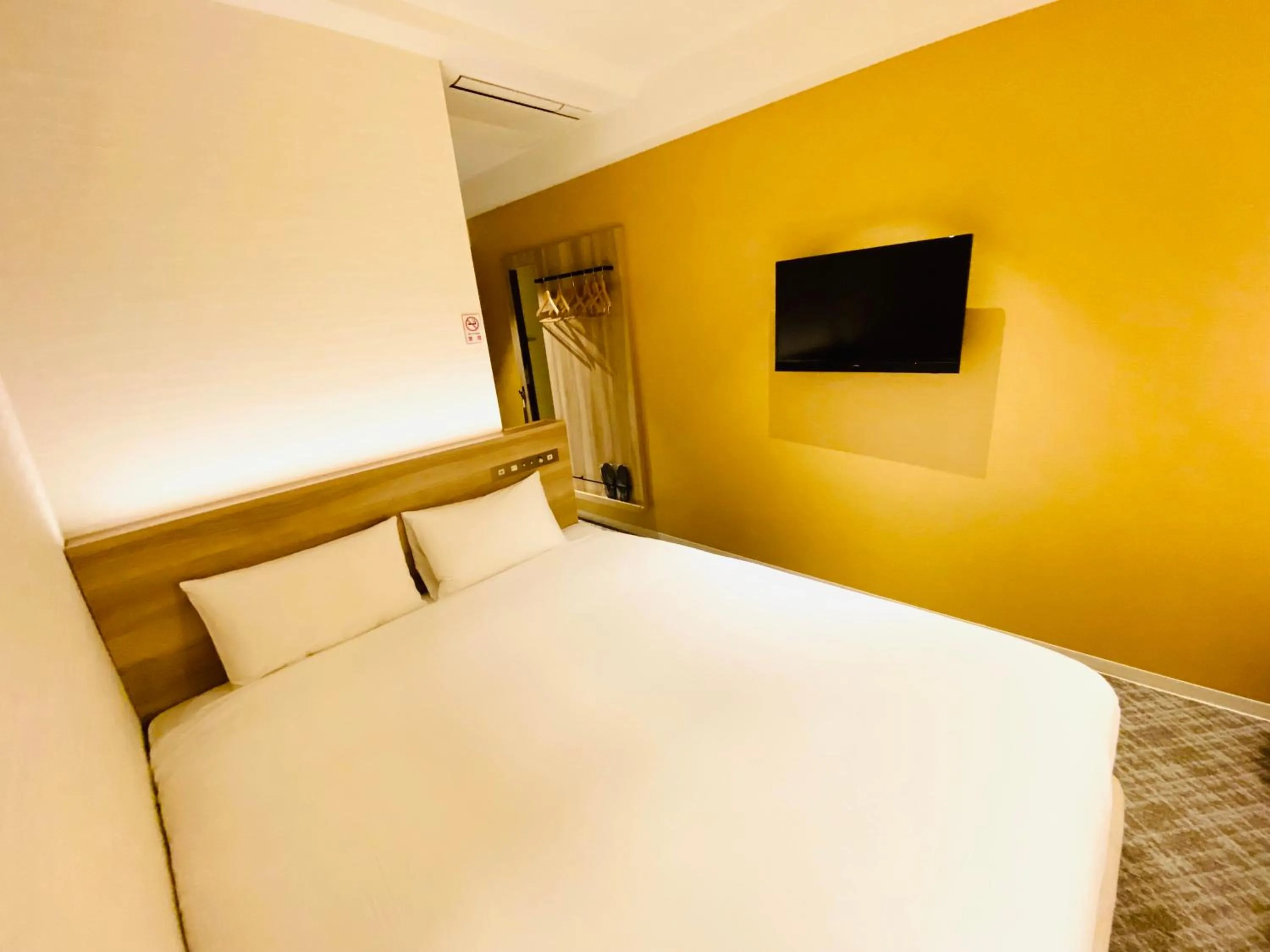 Photo of the whole room, Bed in IAM HOTEL