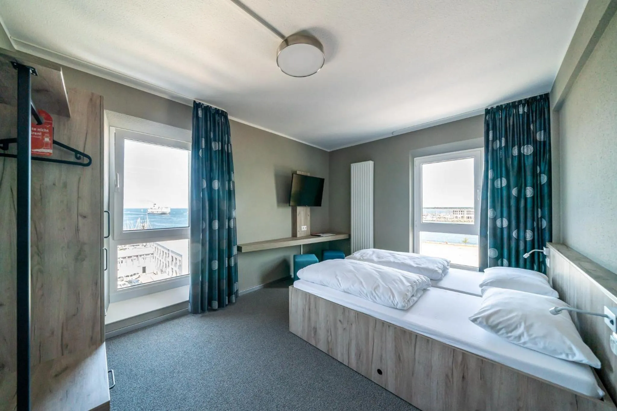 Photo of the whole room, Bed in WIROtel Warnemünde