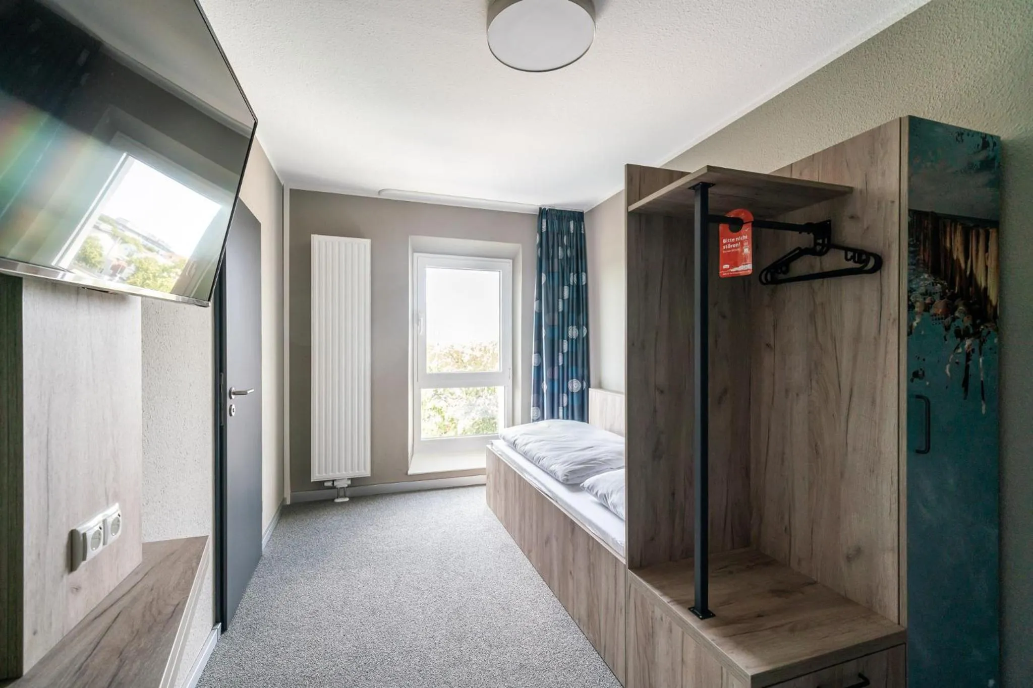 Photo of the whole room, Bed in WIROtel Warnemünde