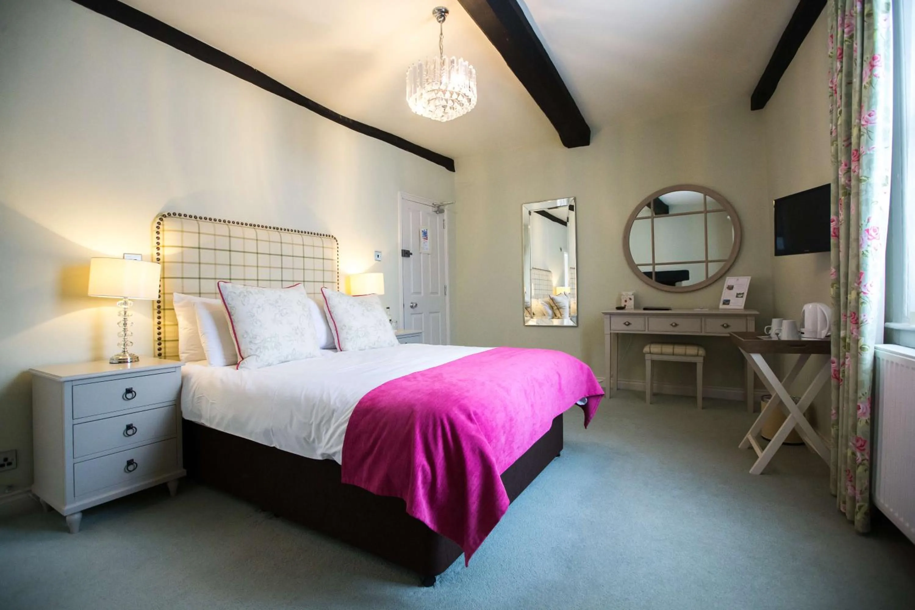 Bed in The Wyndham Hotel