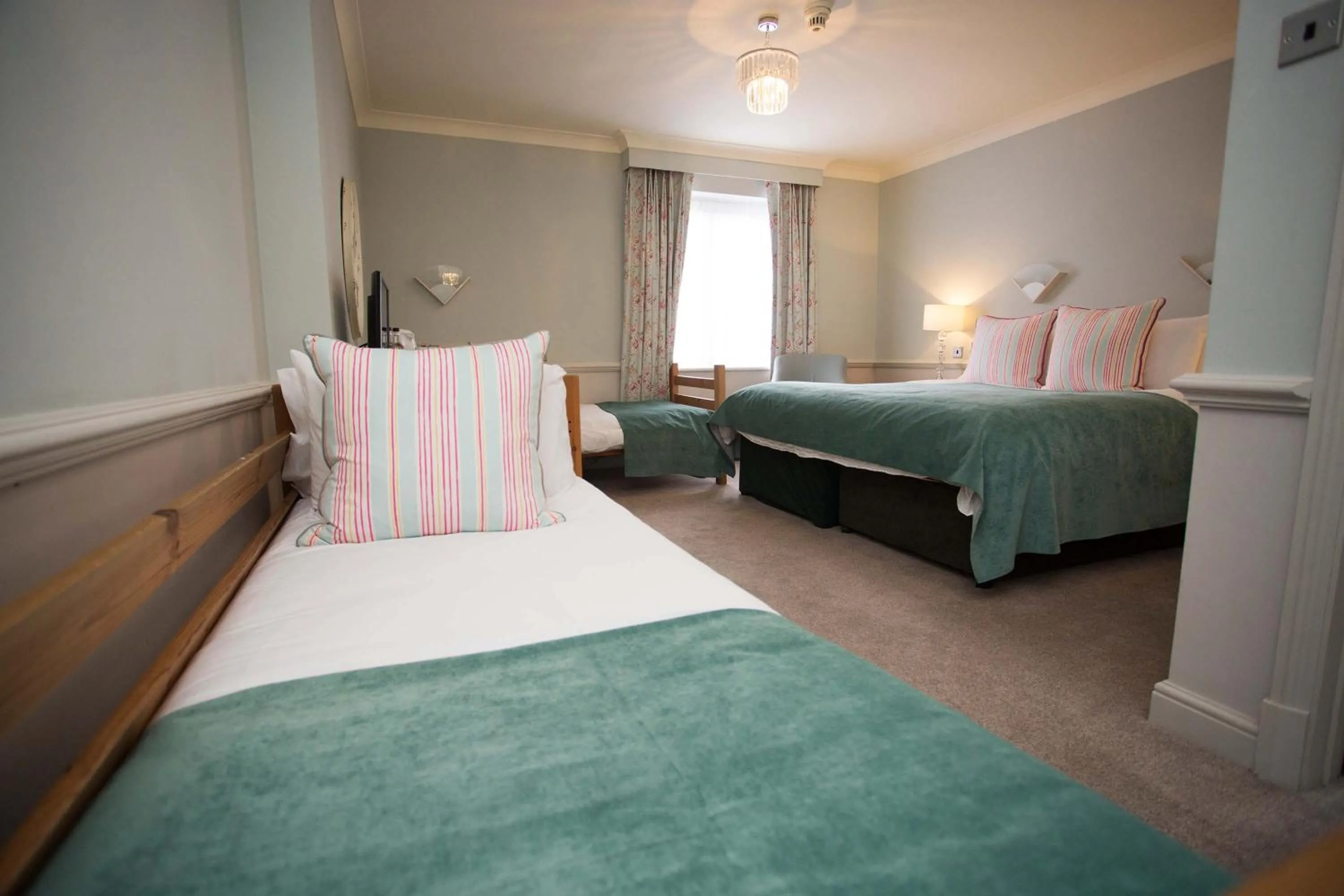 Bed in The Wyndham Hotel