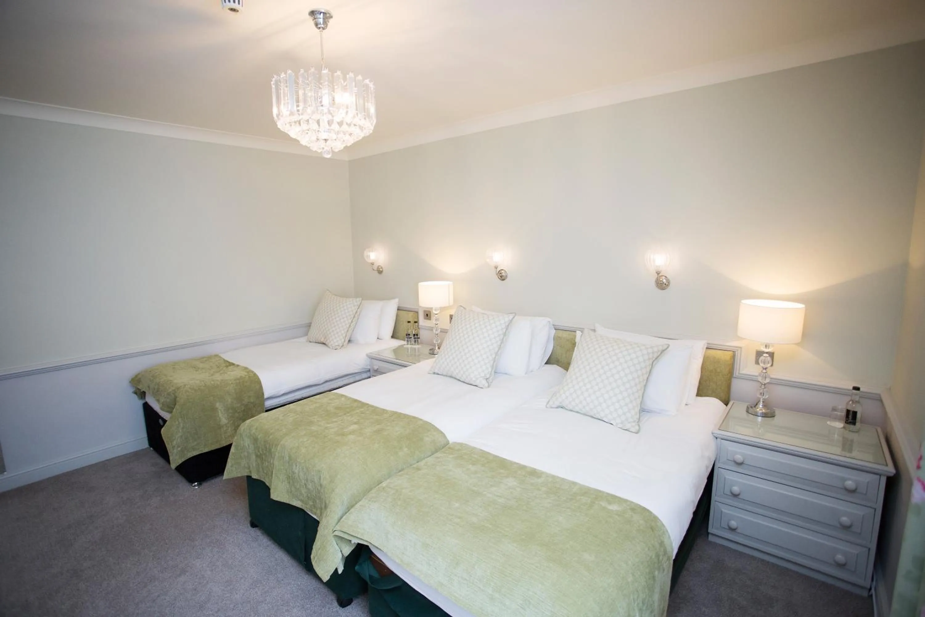 Bed in The Wyndham Hotel