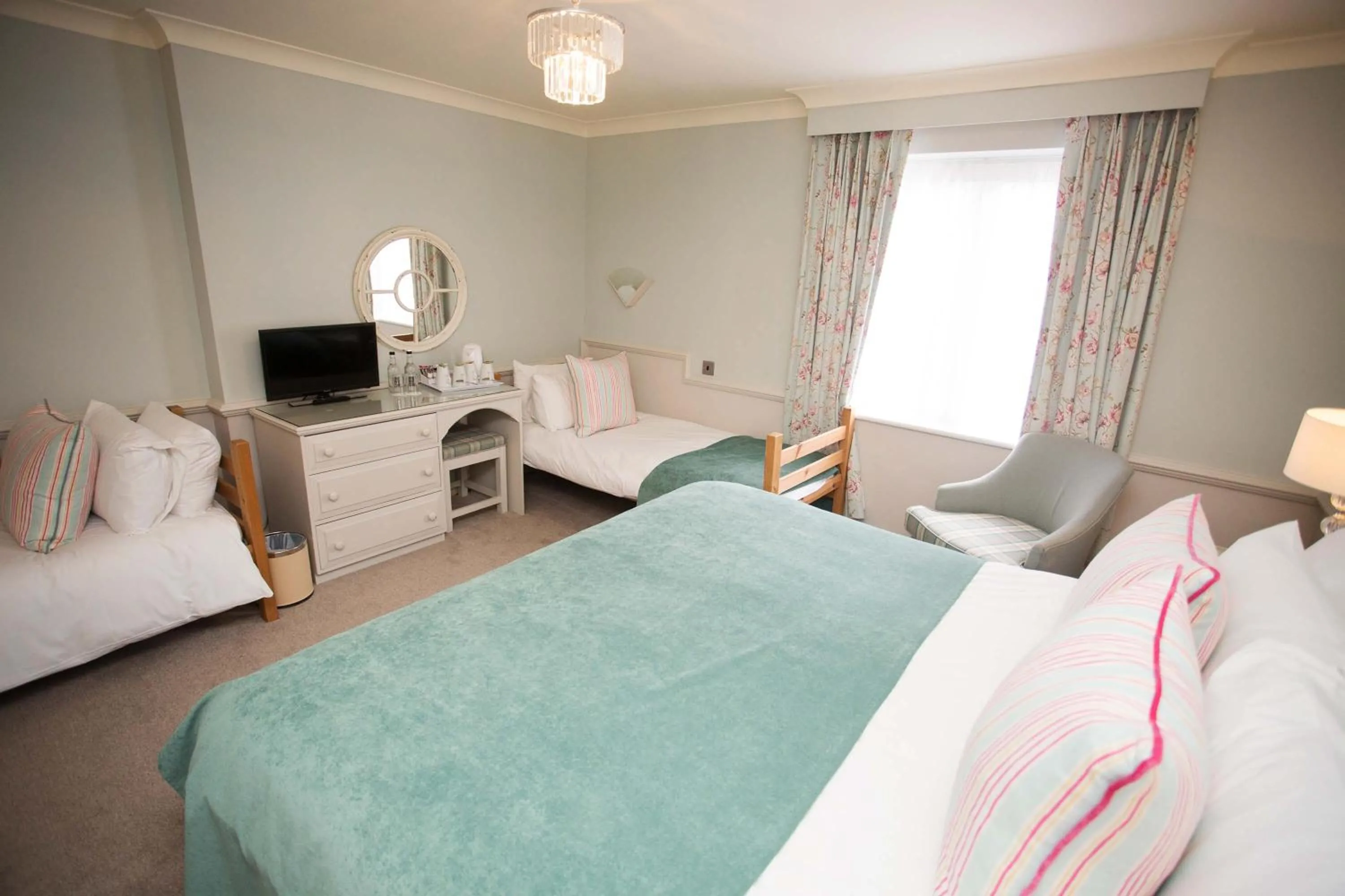 Bed in The Wyndham Hotel