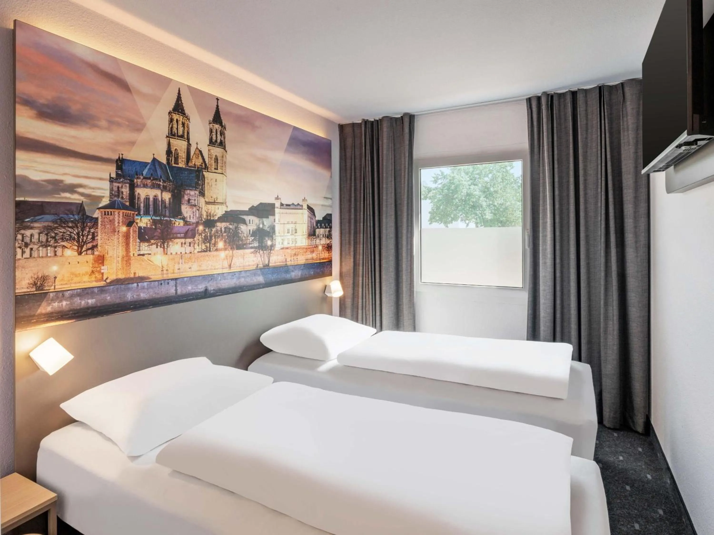 Photo of the whole room, Bed in B&B HOTEL Magdeburg-Barleben