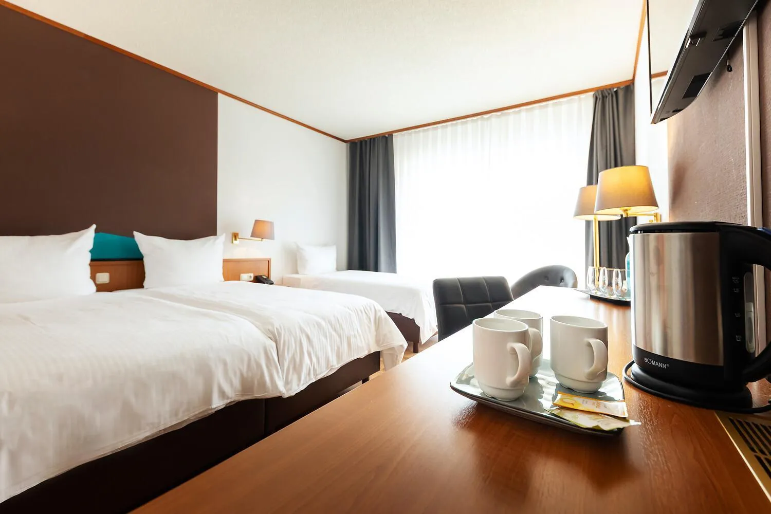 Bed in ACHAT Hotel Frankfurt Maintal