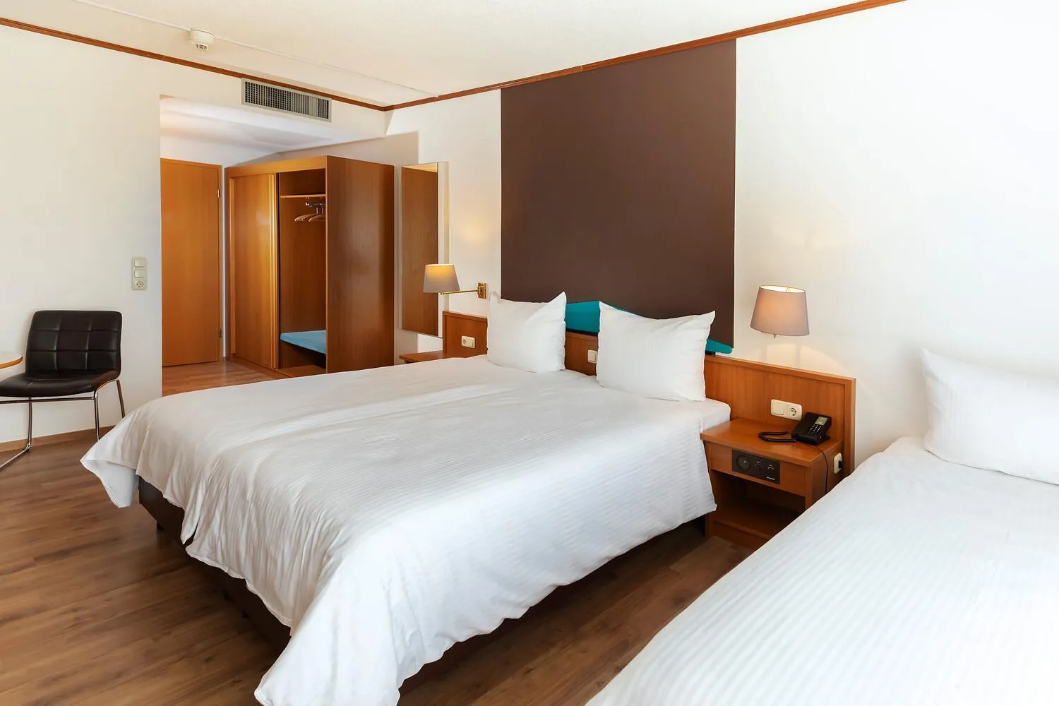 Bed in ACHAT Hotel Frankfurt Maintal