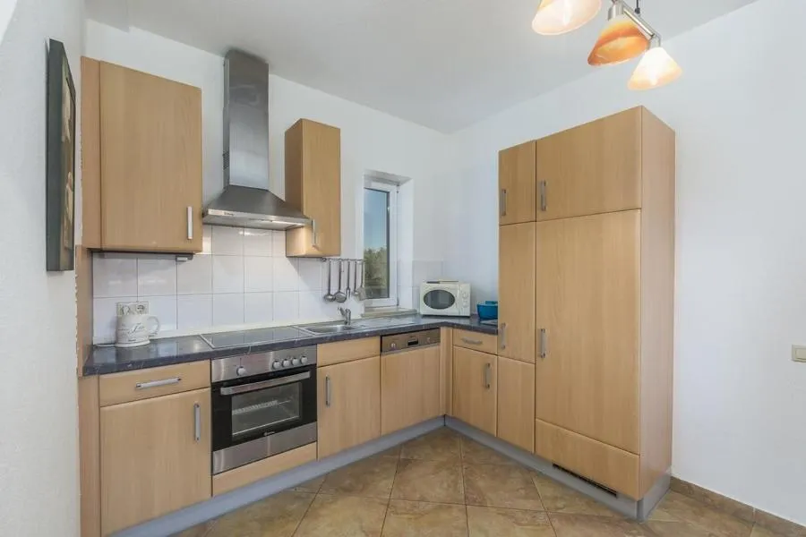Kitchen or kitchenette in Holiday Home Rosie