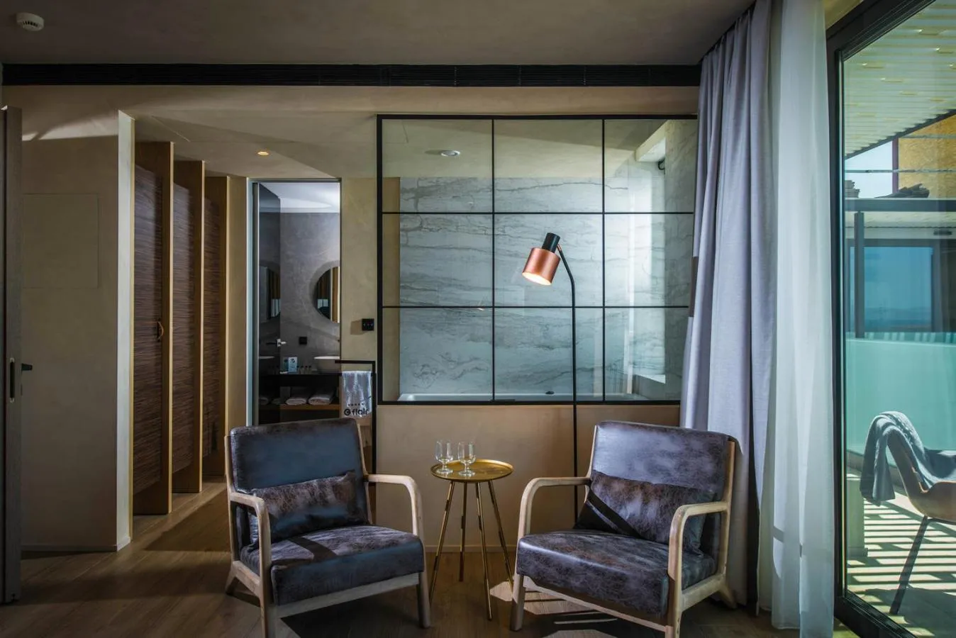 Seating area in Chania Flair Boutique Hotel, Adults only, Tapestry Collection by Hilton