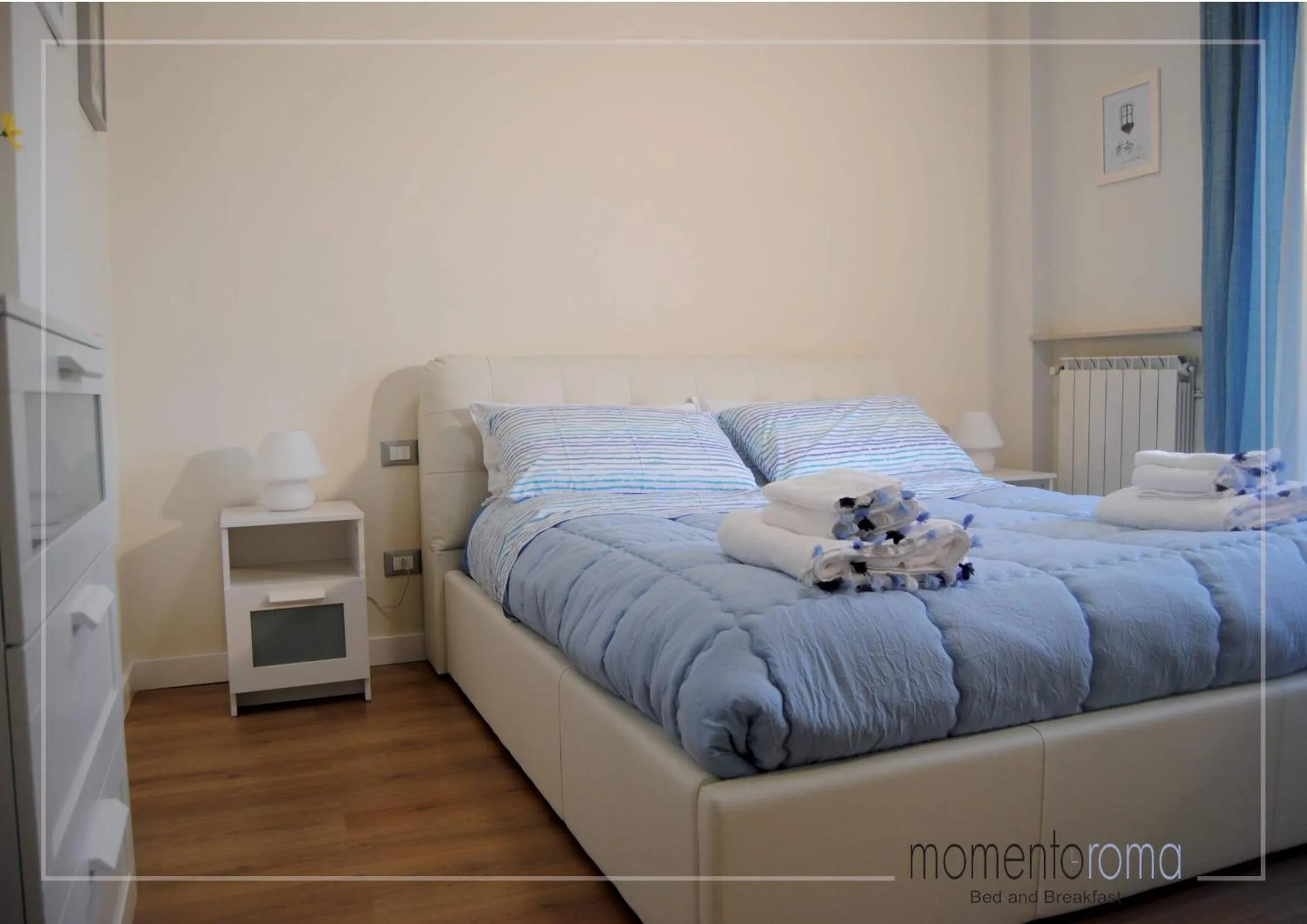 Bed in Momentoroma b&b