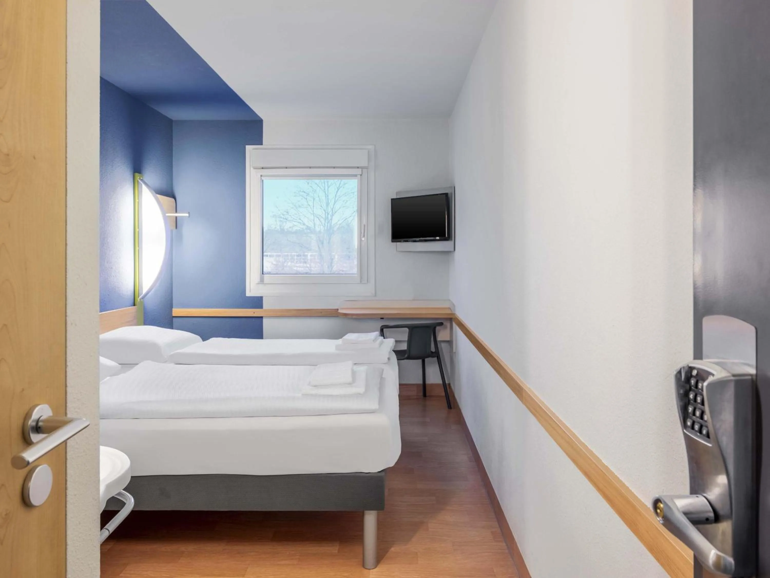 Bed in B&B HOTEL Düsseldorf-Lintorf