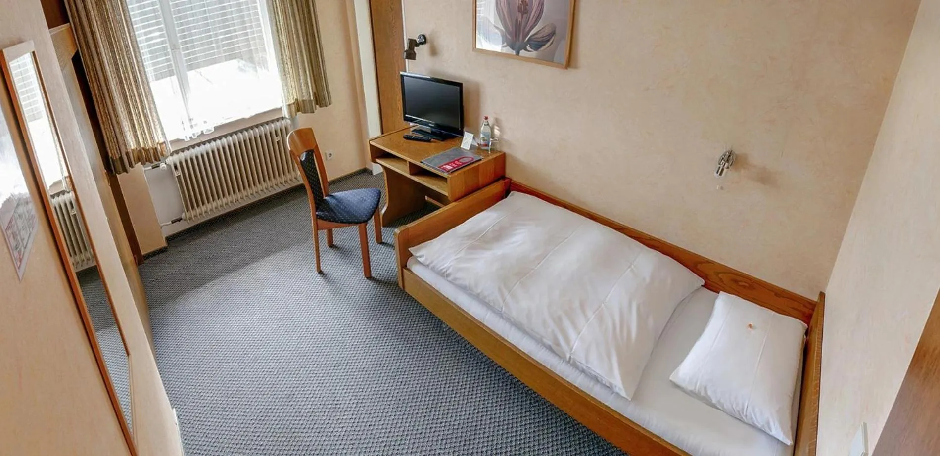 Bed in Hotel Keinath Stuttgart