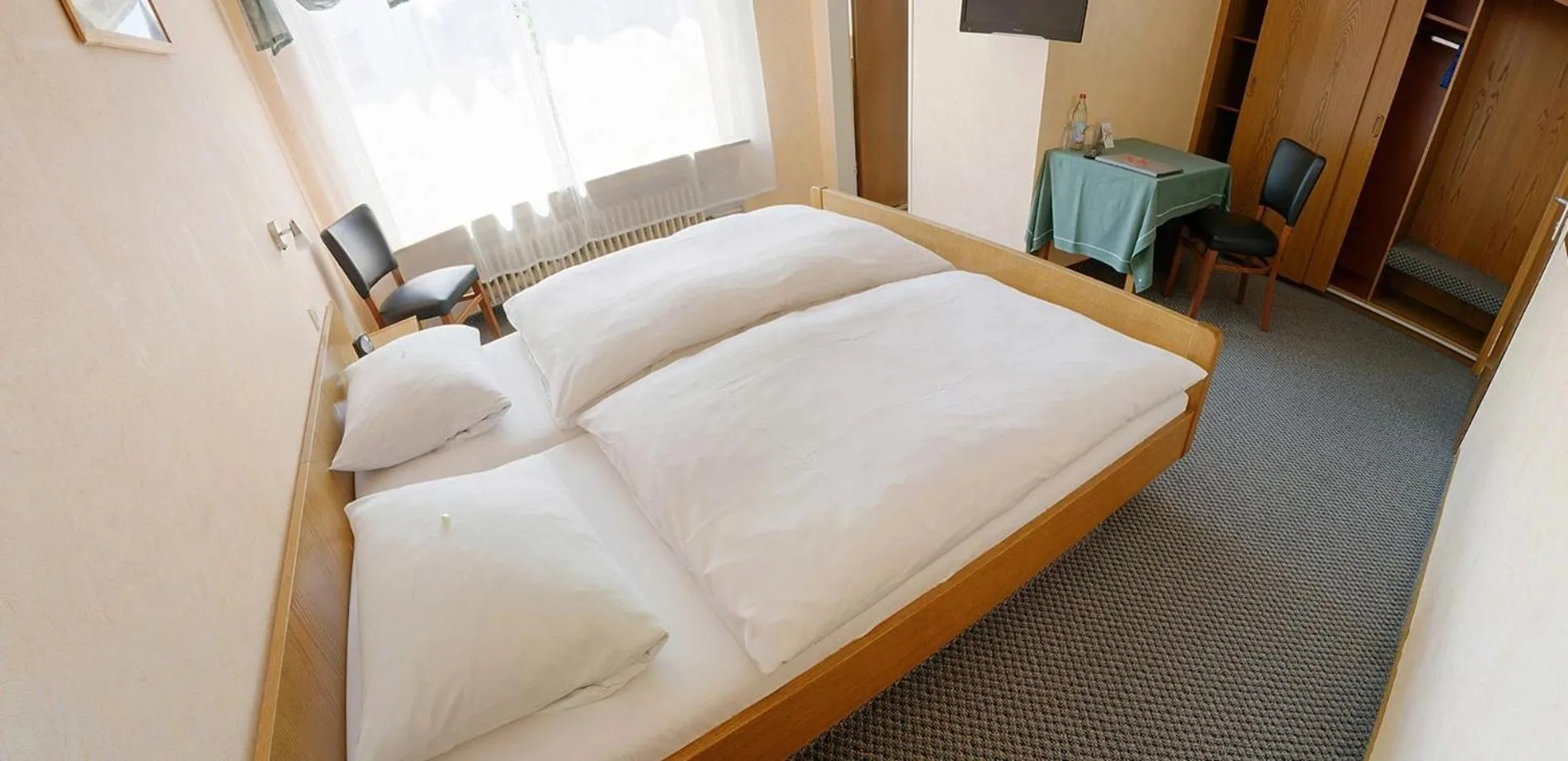 Bed in Hotel Keinath Stuttgart