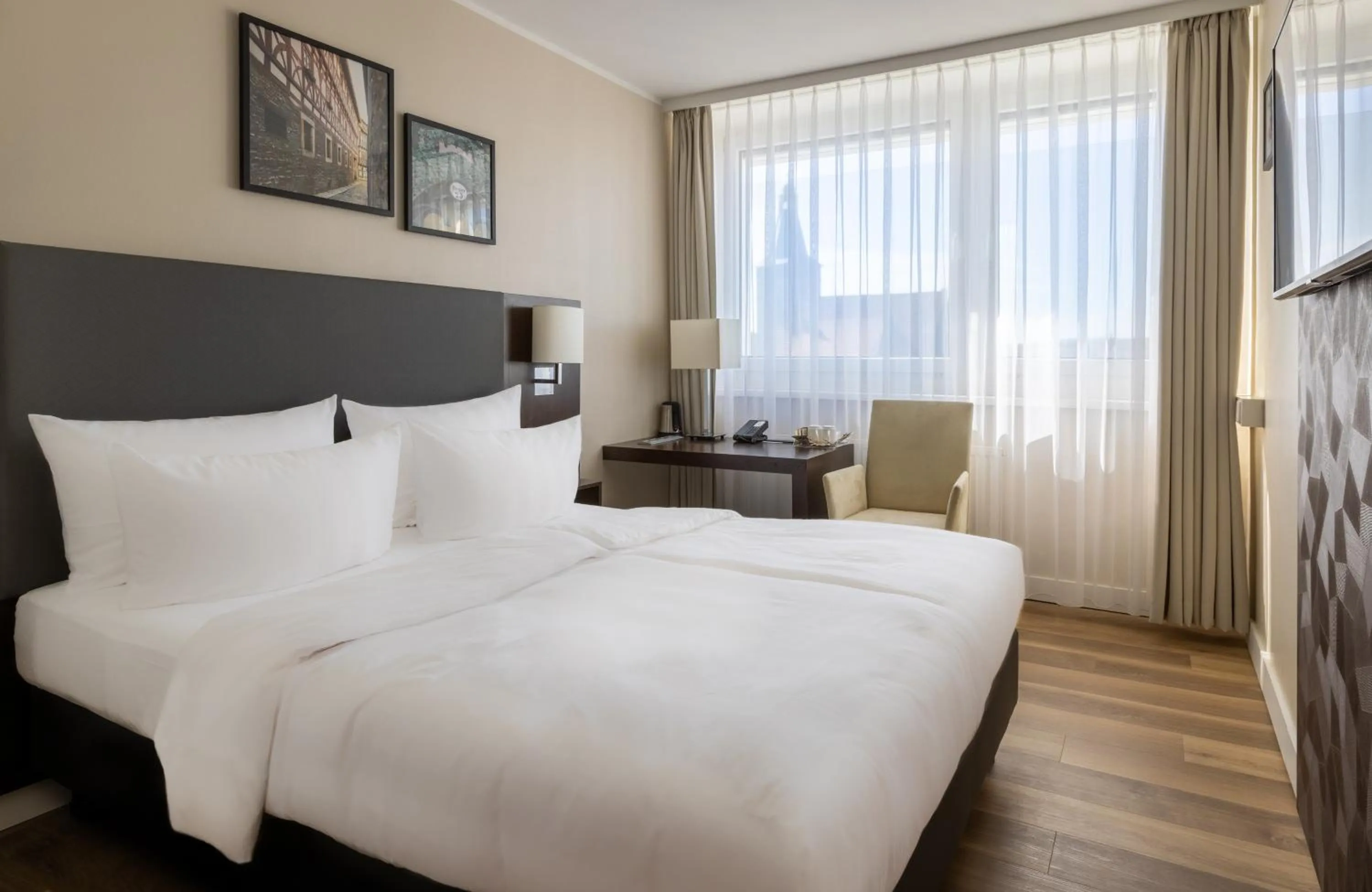 Bed in NYX Hotel Erfurt by Leonardo Hotels