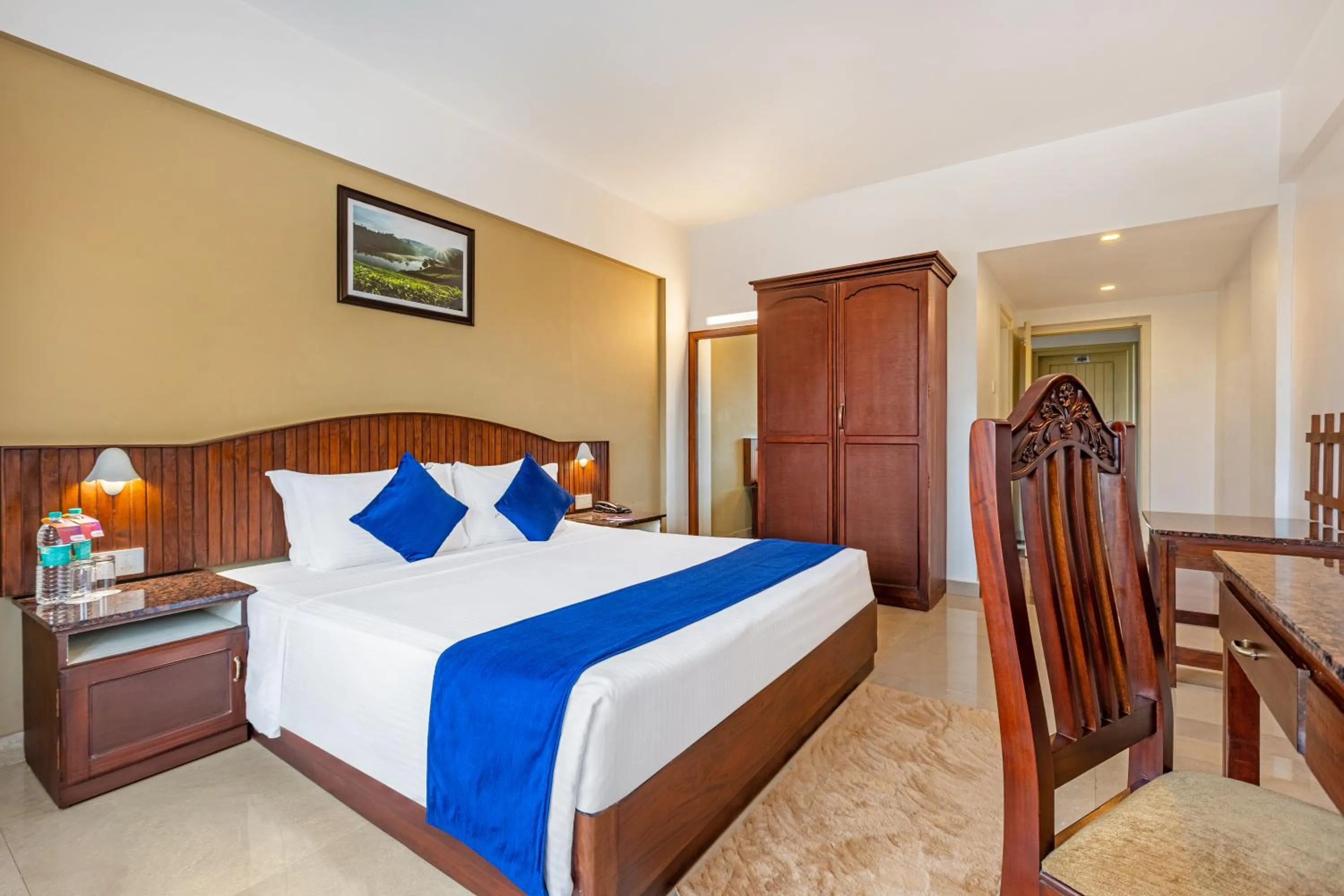 Photo of the whole room, Bed in Sterling Darshan Guruvayur