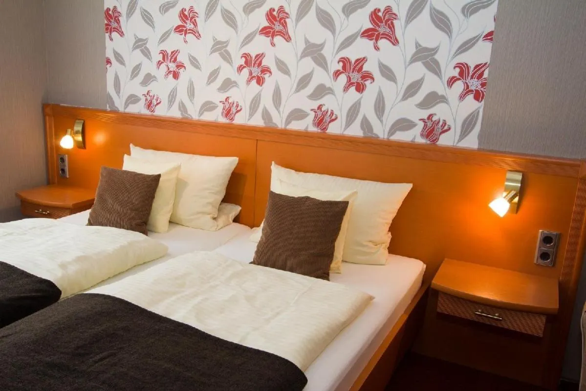 Bed in Hotel-garni-Kachelburg