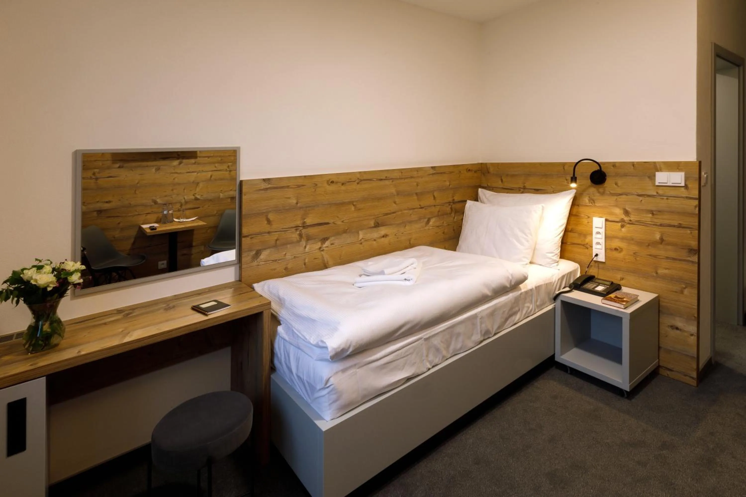 Photo of the whole room, Bed in Sporthotel Olympia