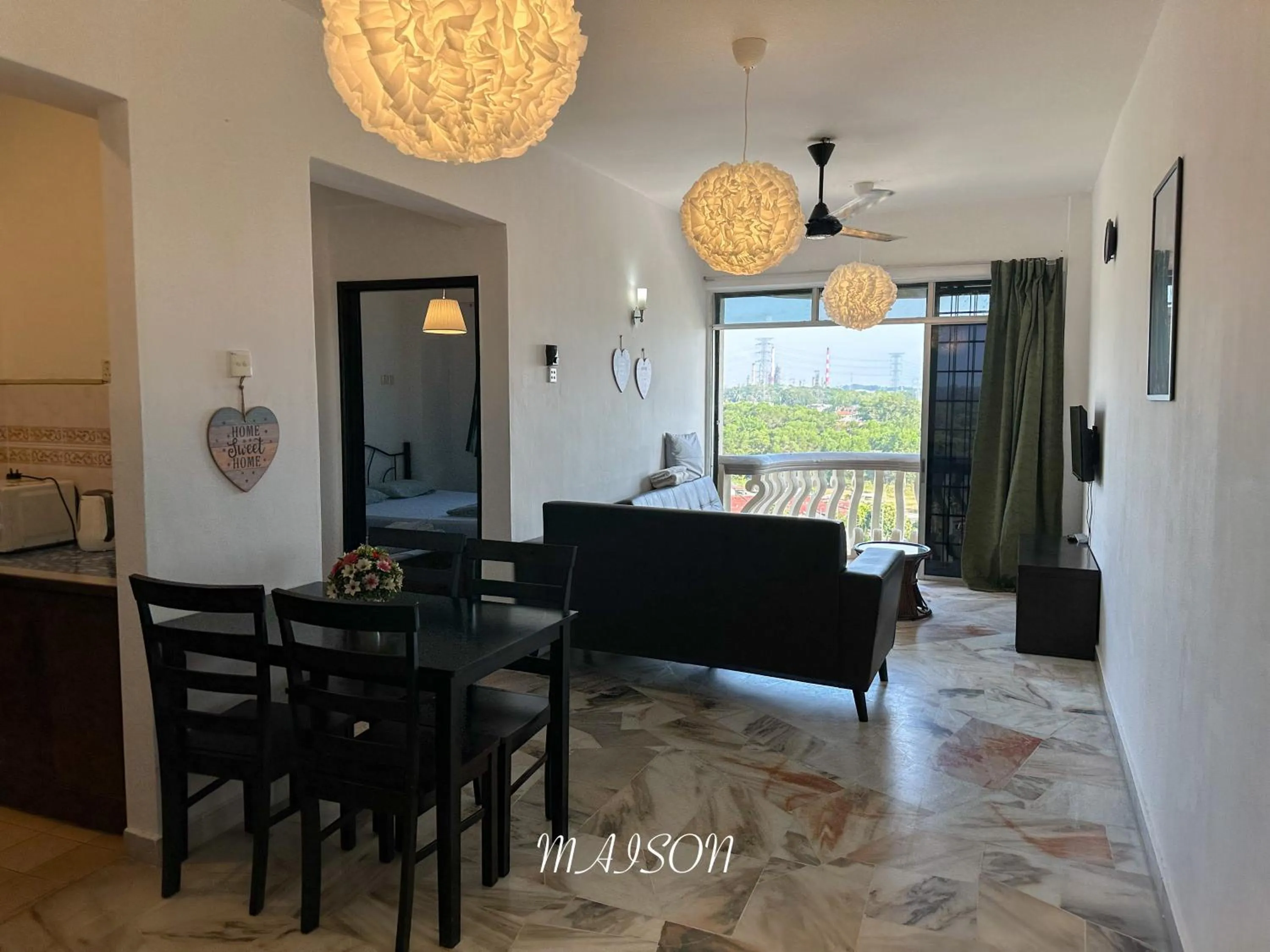 Bed in Maison Seaview Suites Port Dickson