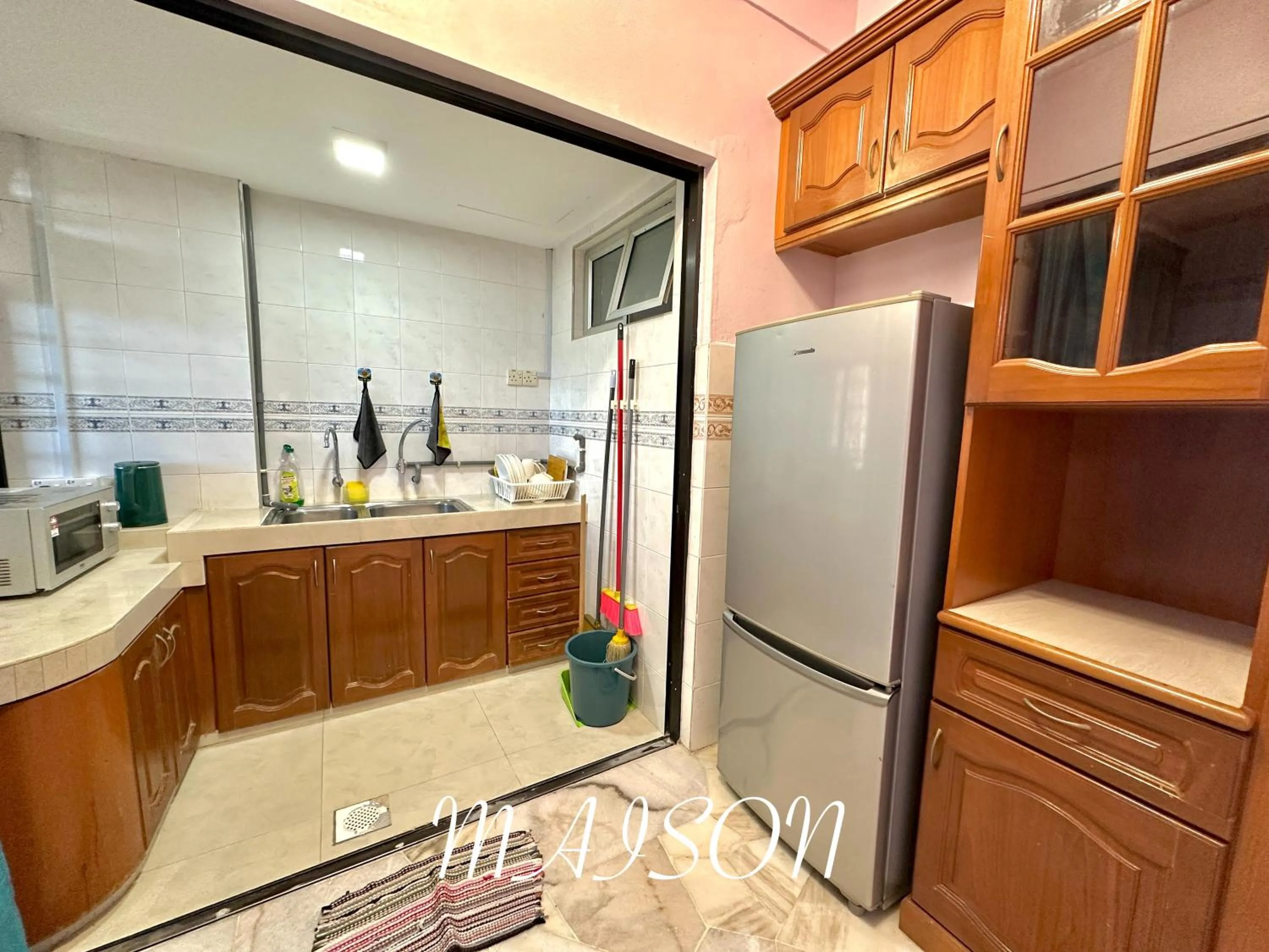 Kitchen or kitchenette in Maison Seaview Suites Port Dickson