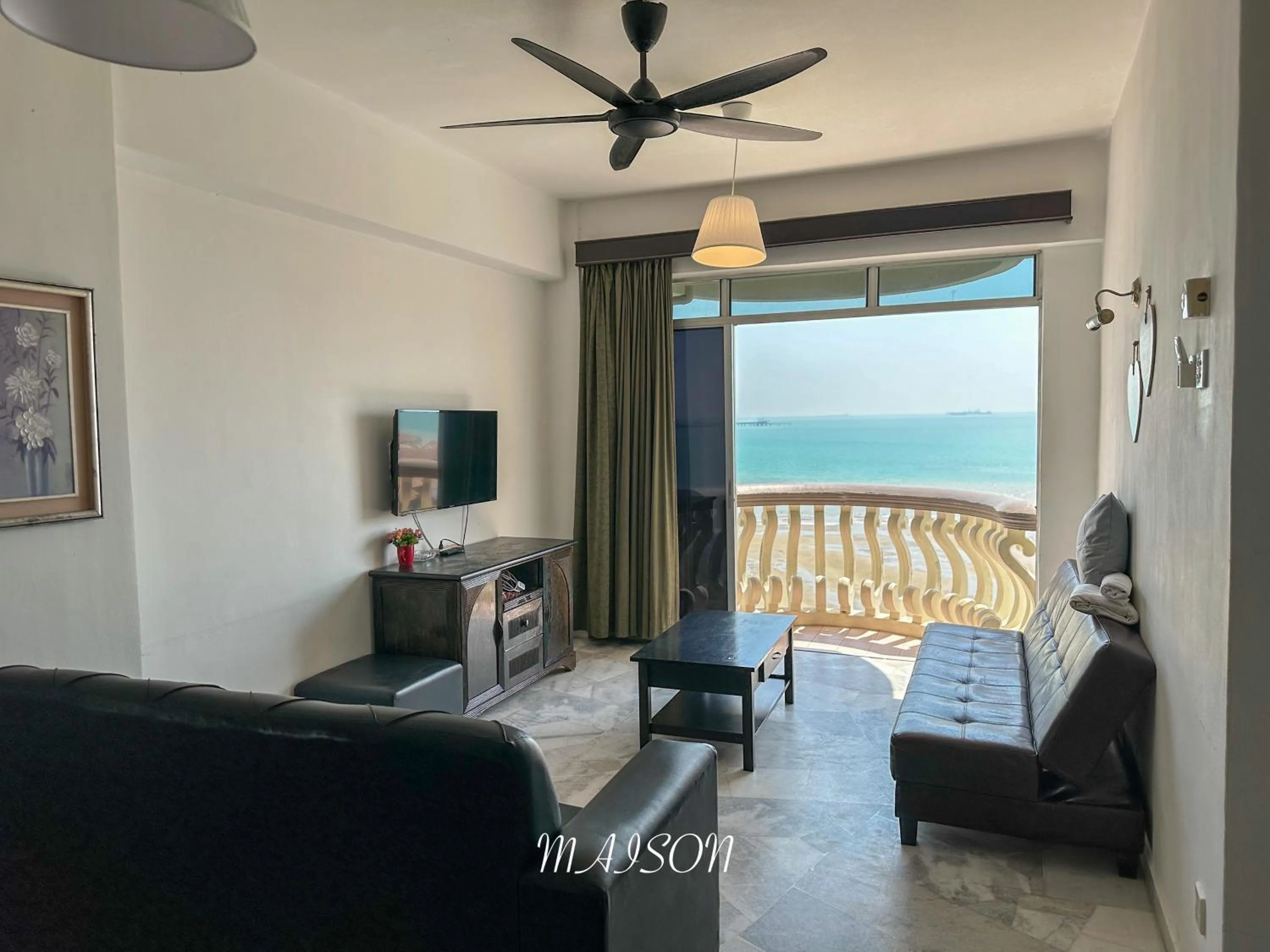 Communal lounge/ TV room in Maison Seaview Suites Port Dickson