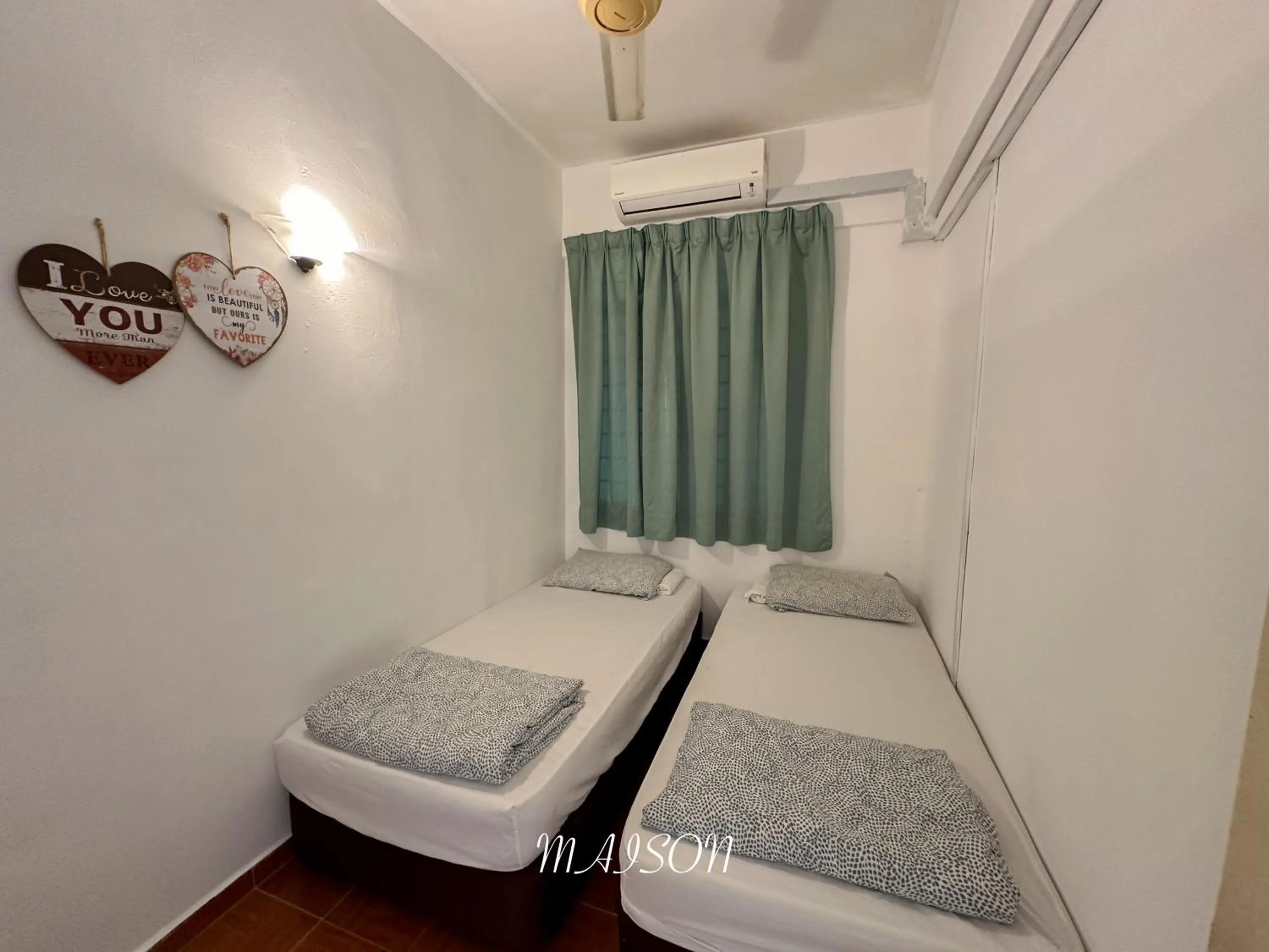 Bed in Maison Seaview Suites Port Dickson