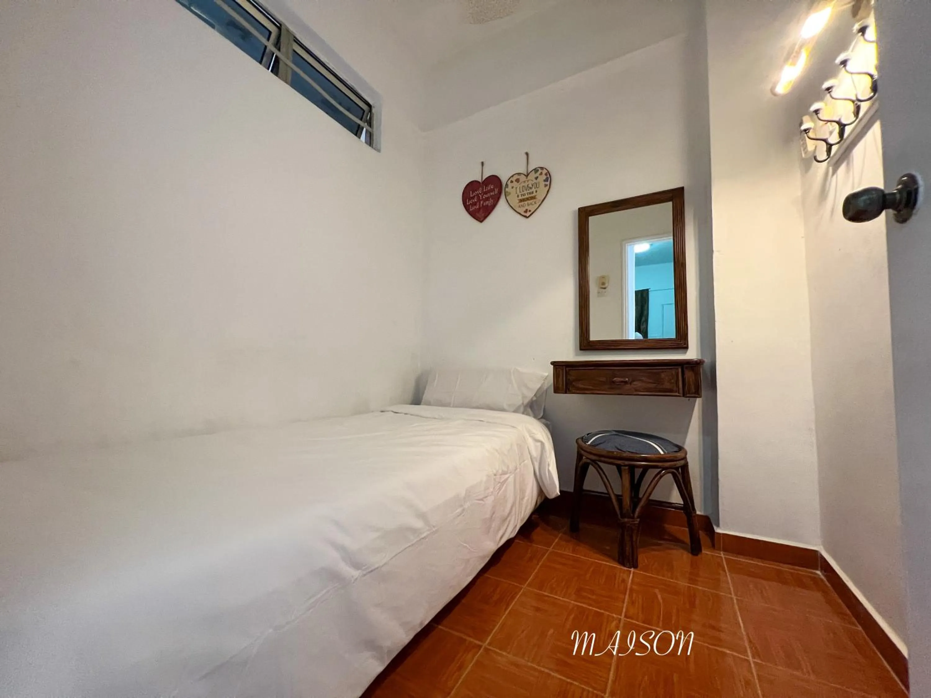 Bed in Maison Seaview Suites Port Dickson