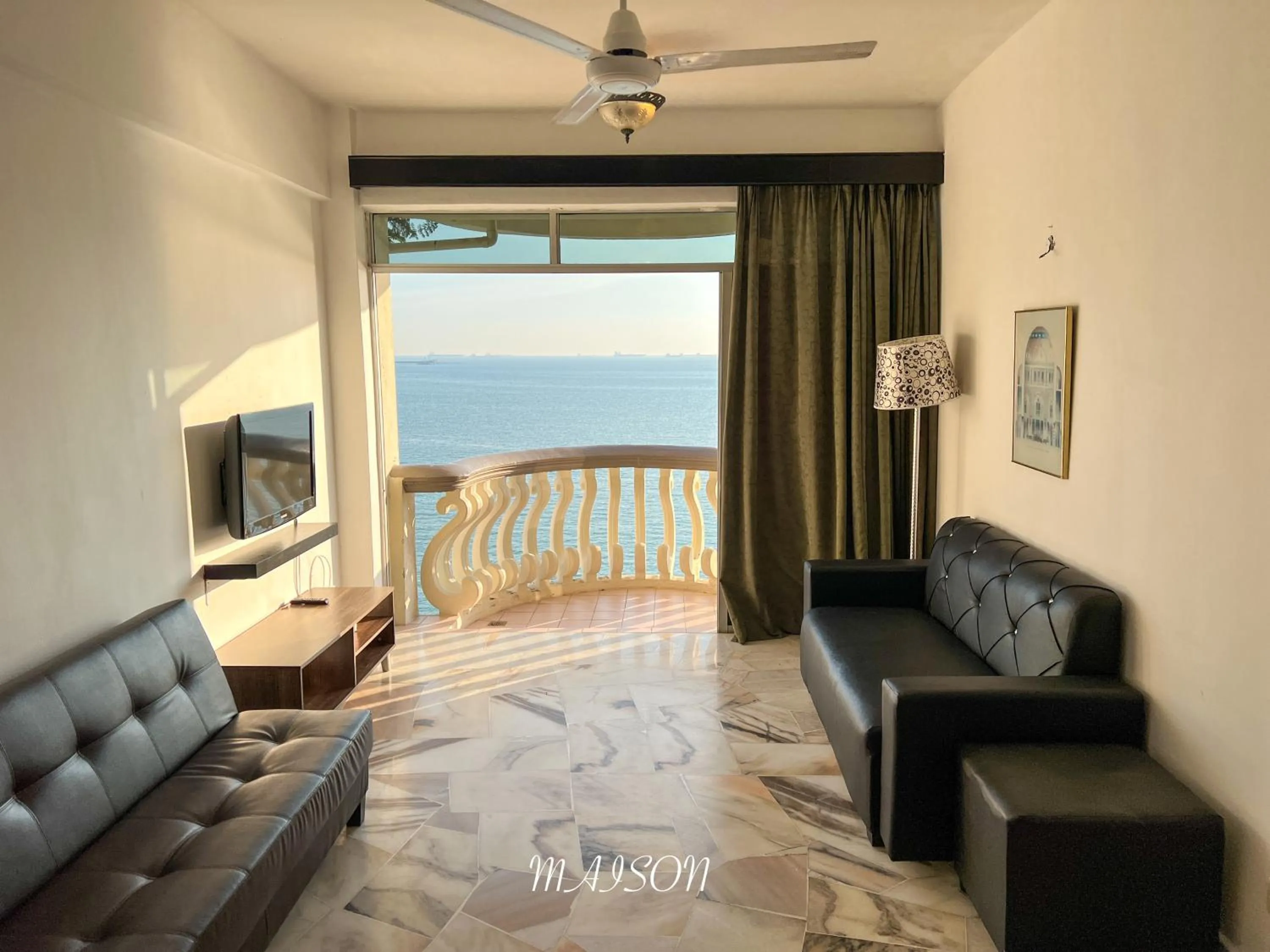 Communal lounge/ TV room, Bed in Maison Seaview Suites Port Dickson