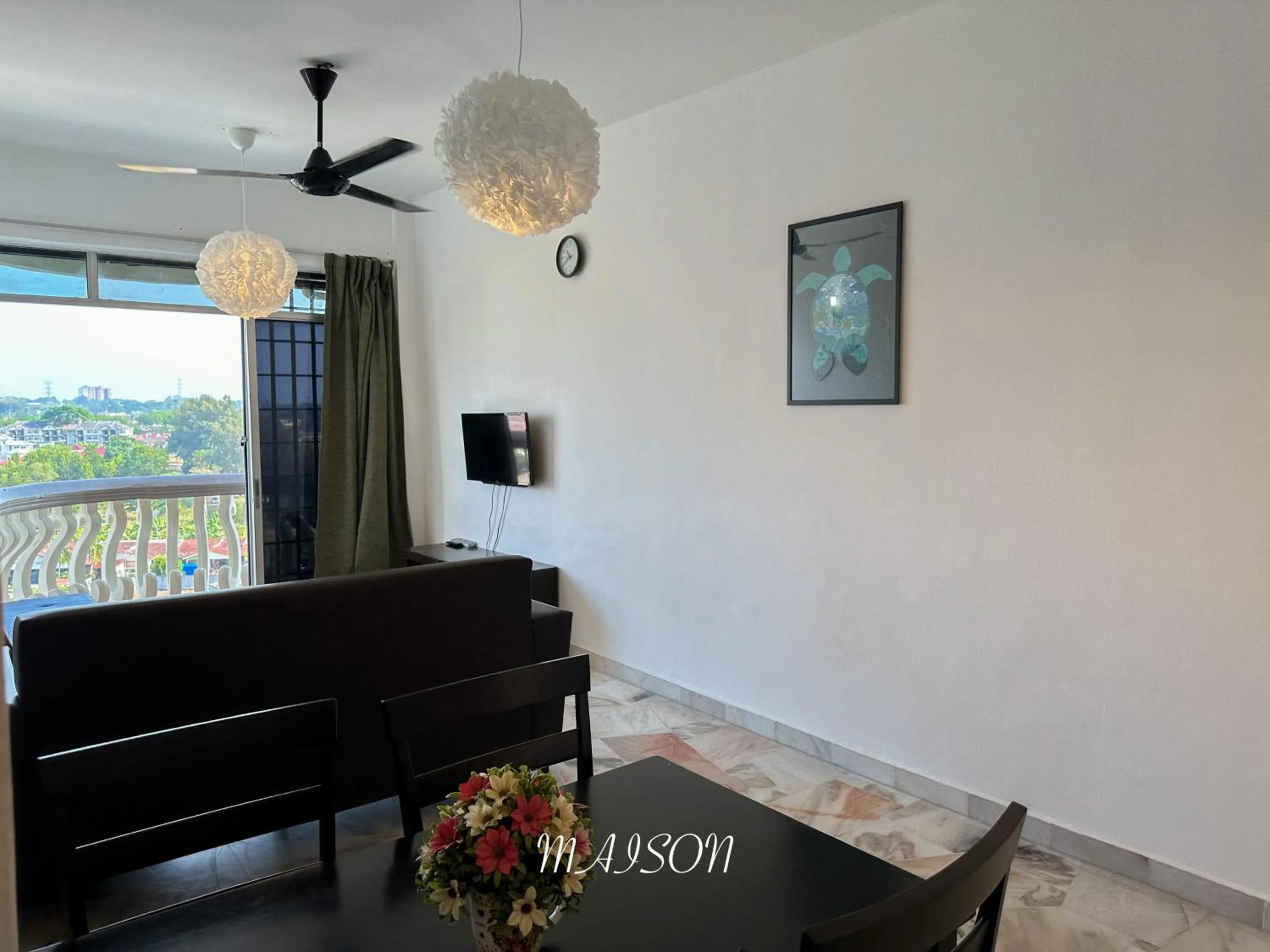 Communal lounge/ TV room in Maison Seaview Suites Port Dickson