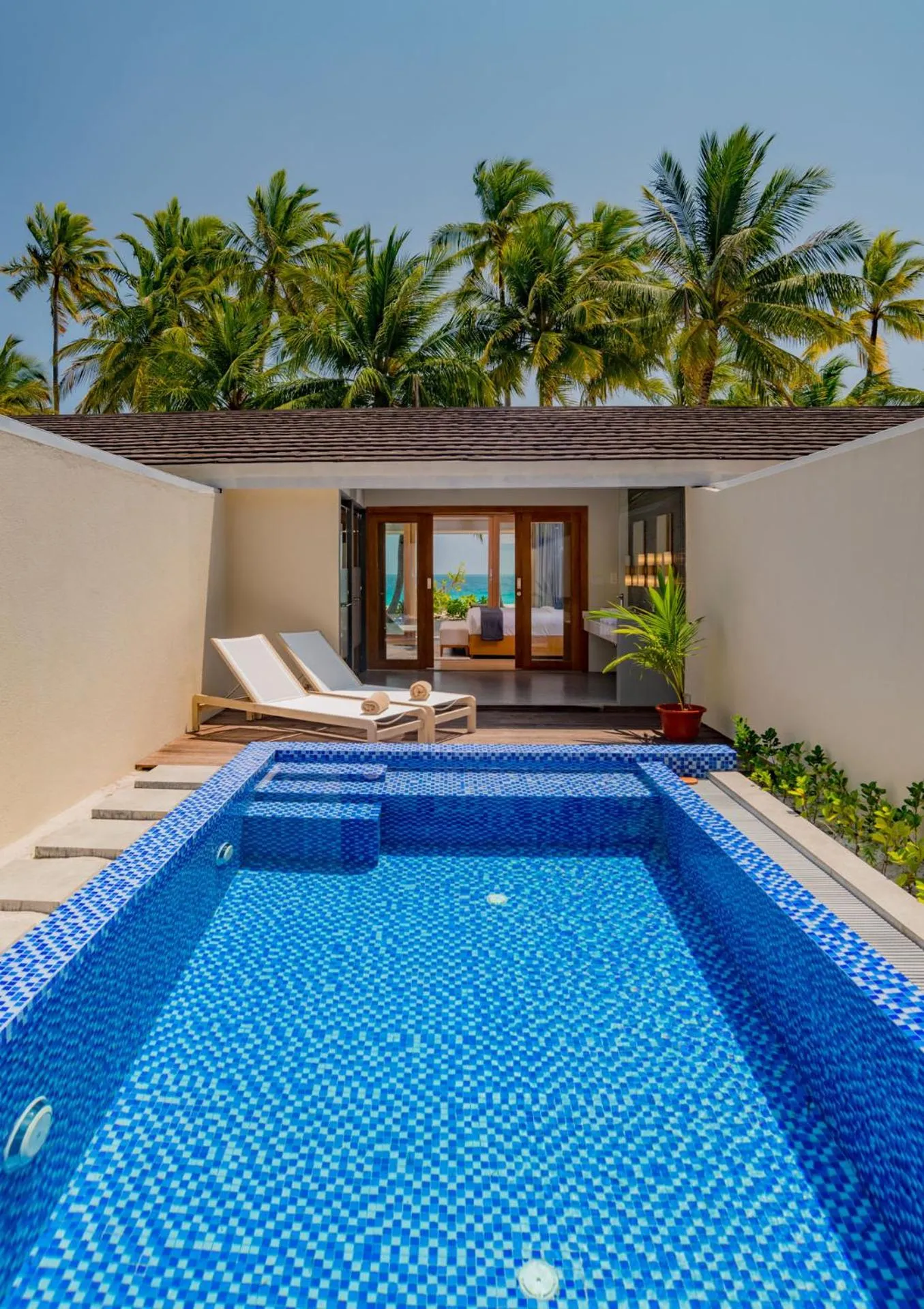 Swimming pool in Fiyavalhu Resort Maldives