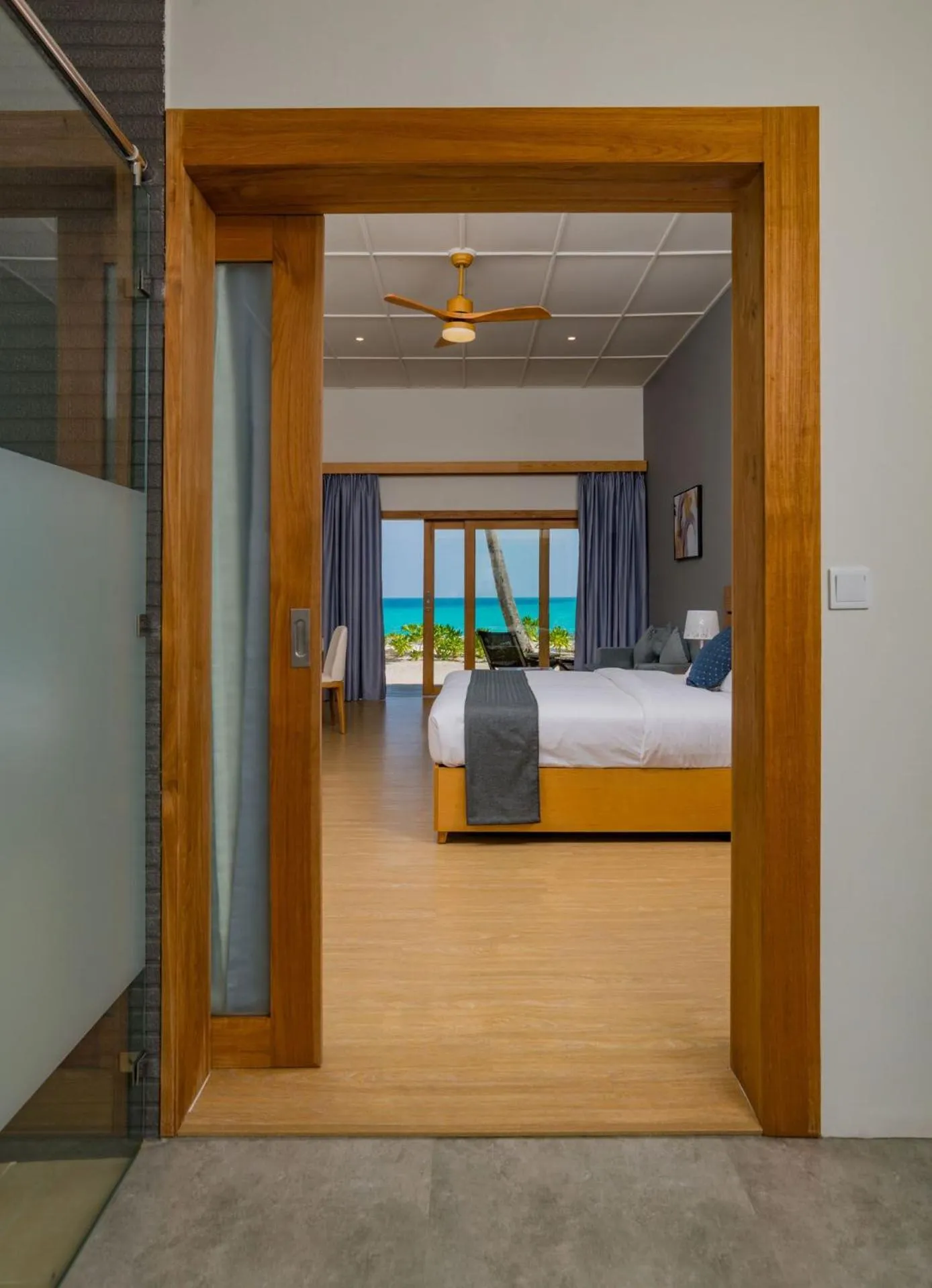 Property building, Bed in Fiyavalhu Resort Maldives