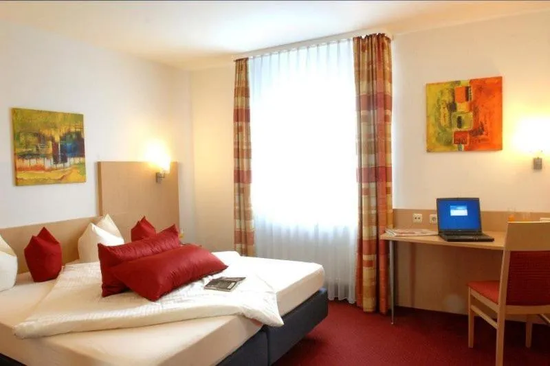 Photo of the whole room, Bed in Hotel Bettina garni