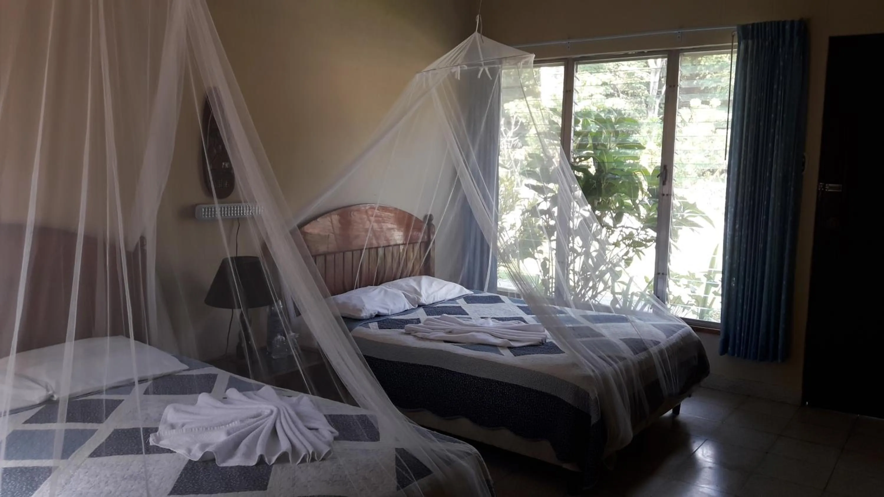 Bed in Hotel Tikal Inn