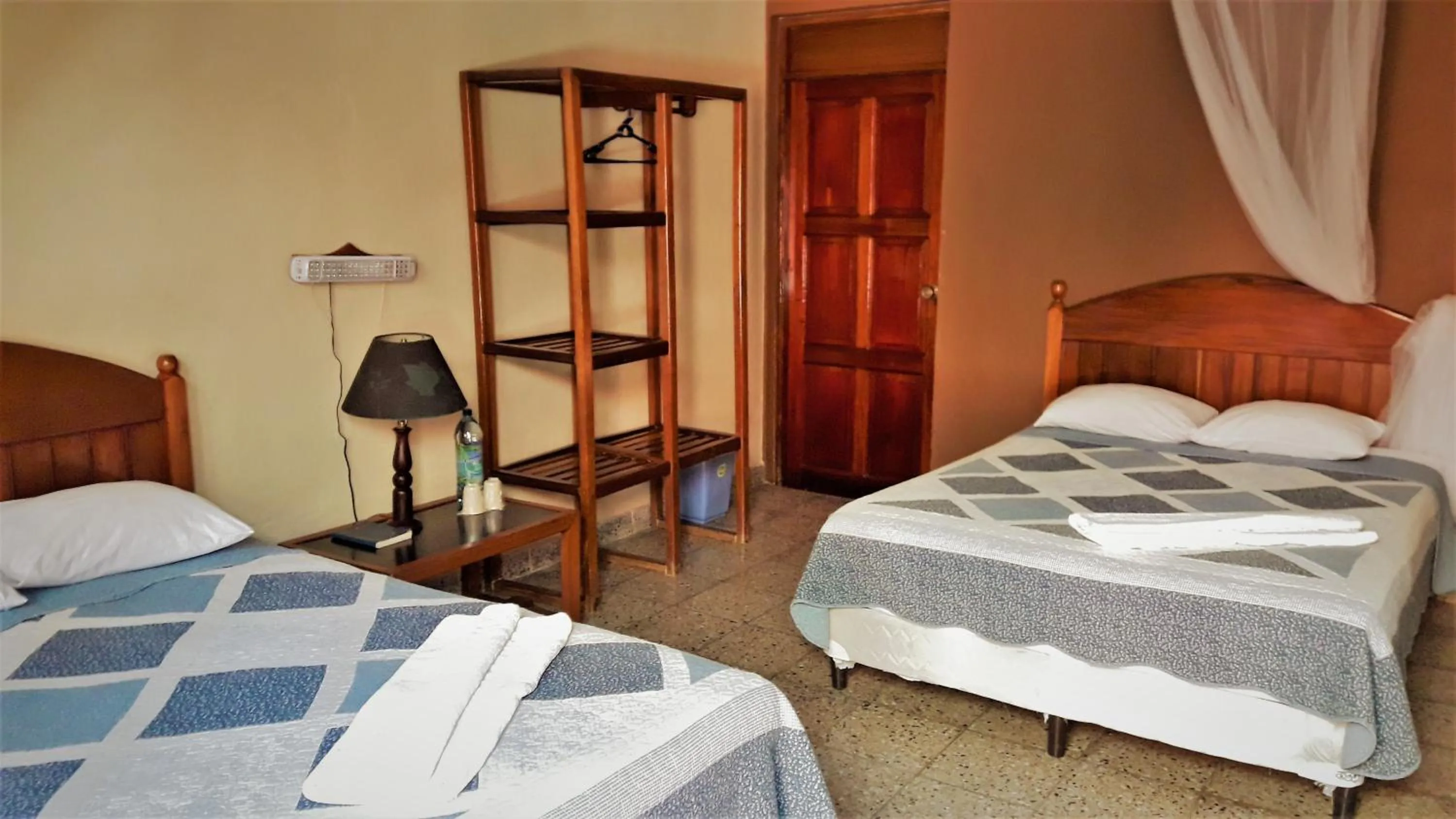 Bed in Hotel Tikal Inn