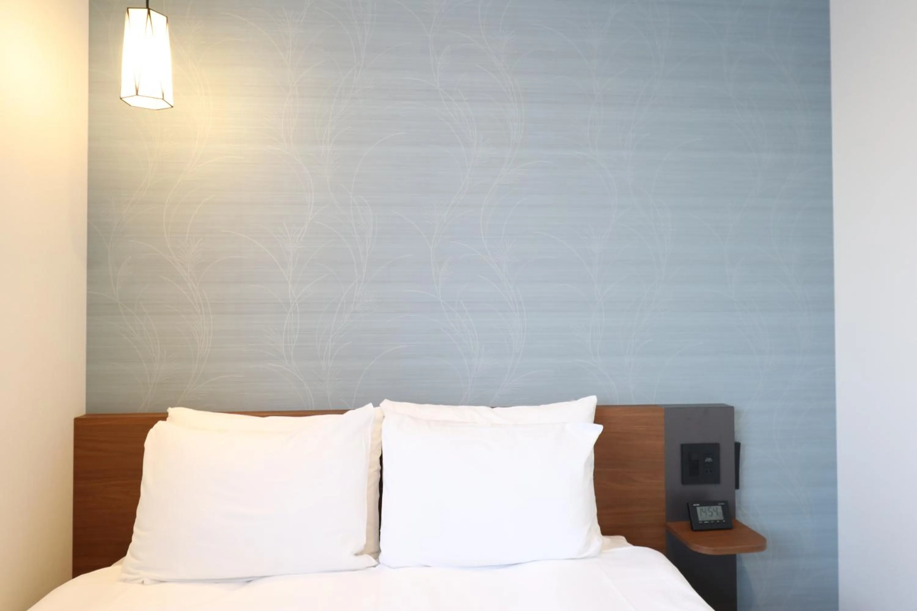 Bed in M's Hotel Nijojo Oike