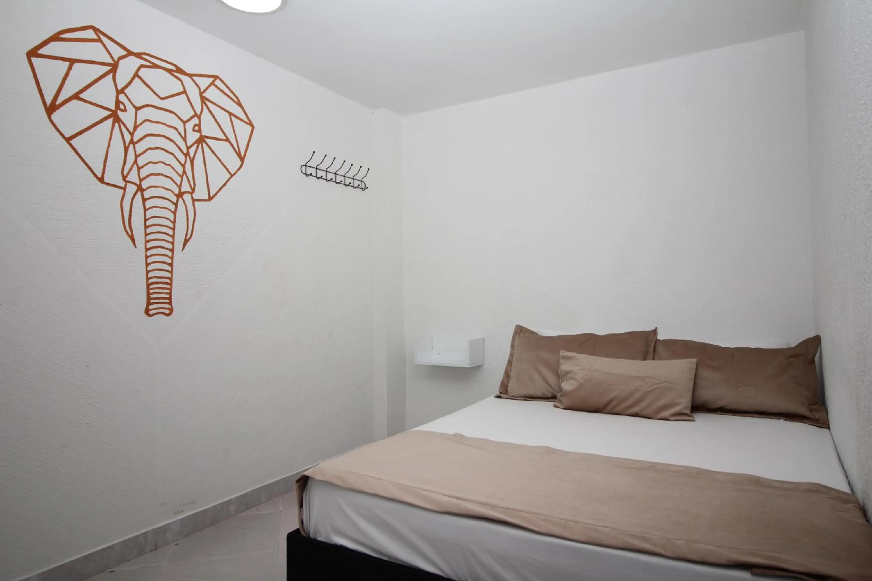 Bed in DAM Hotel Pereira