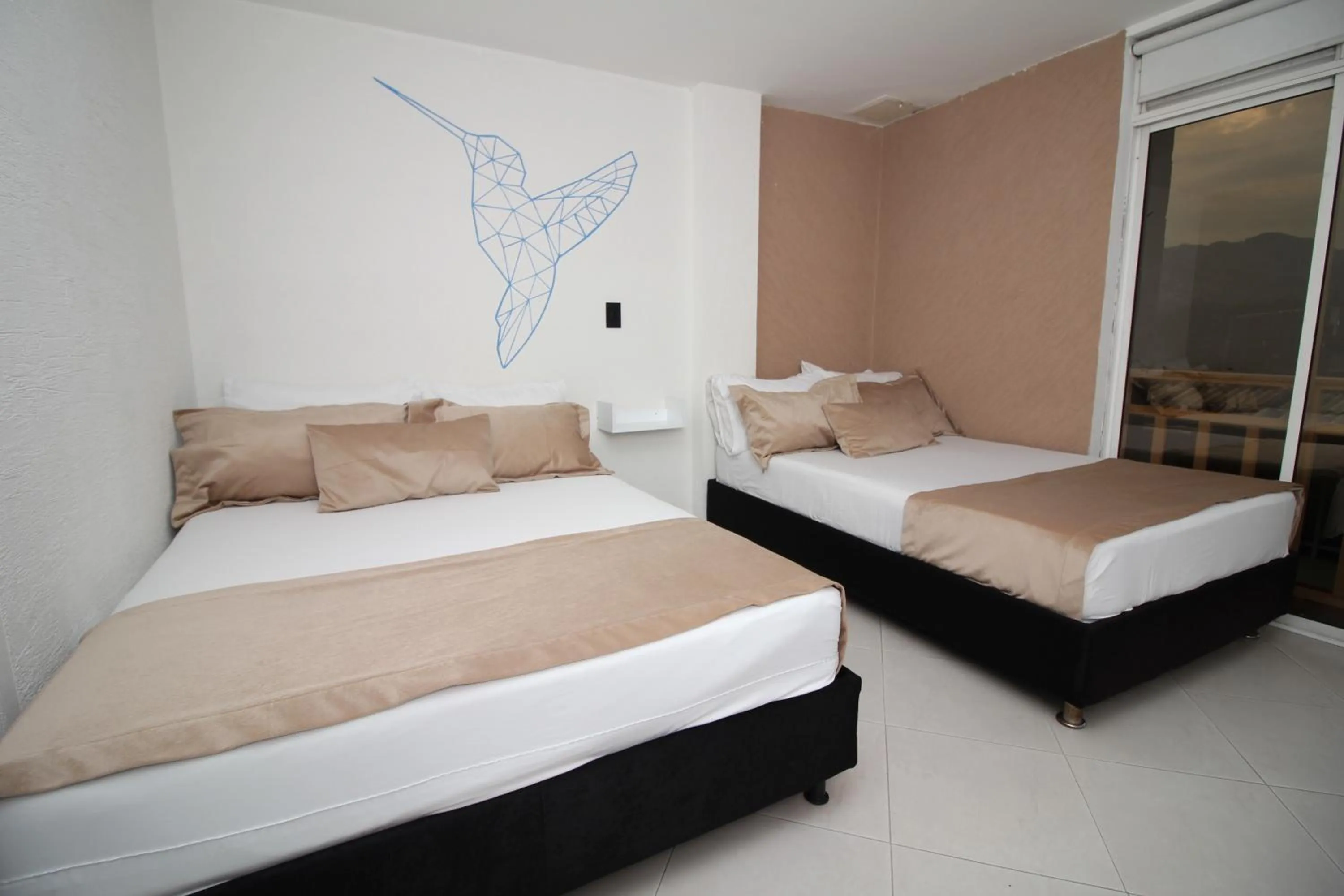 Bed in DAM Hotel Pereira