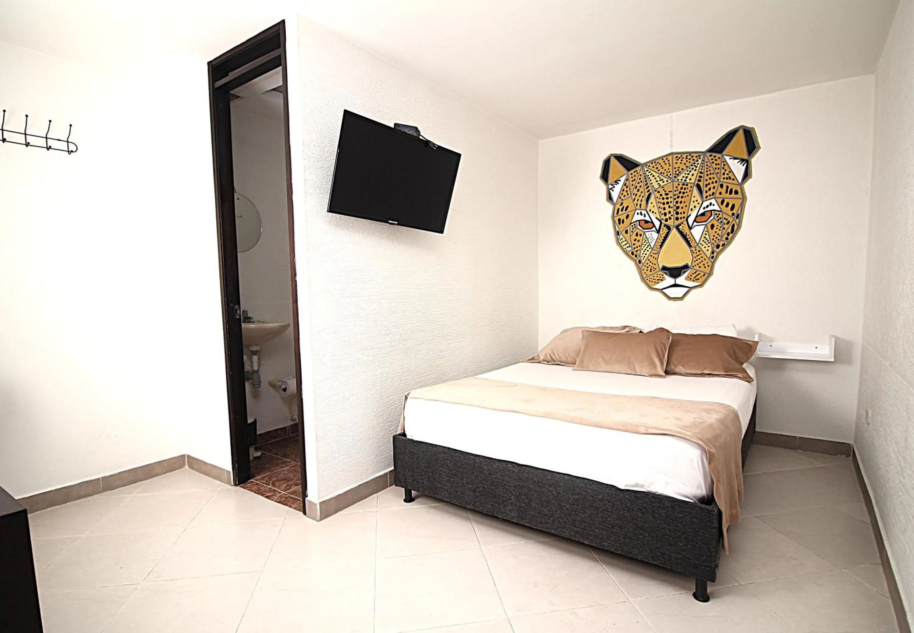 Bed in DAM Hotel Pereira