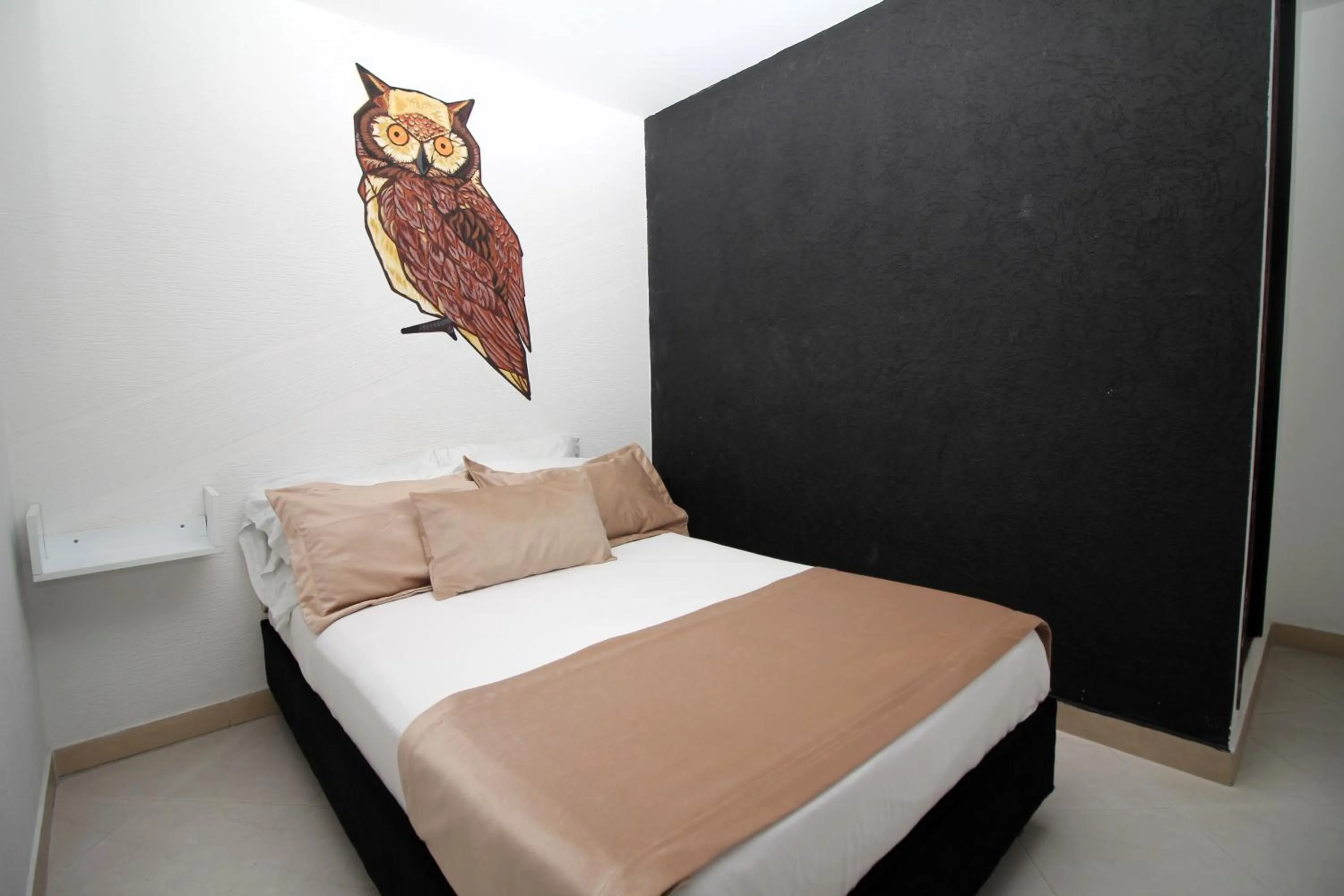 Bed in DAM Hotel Pereira