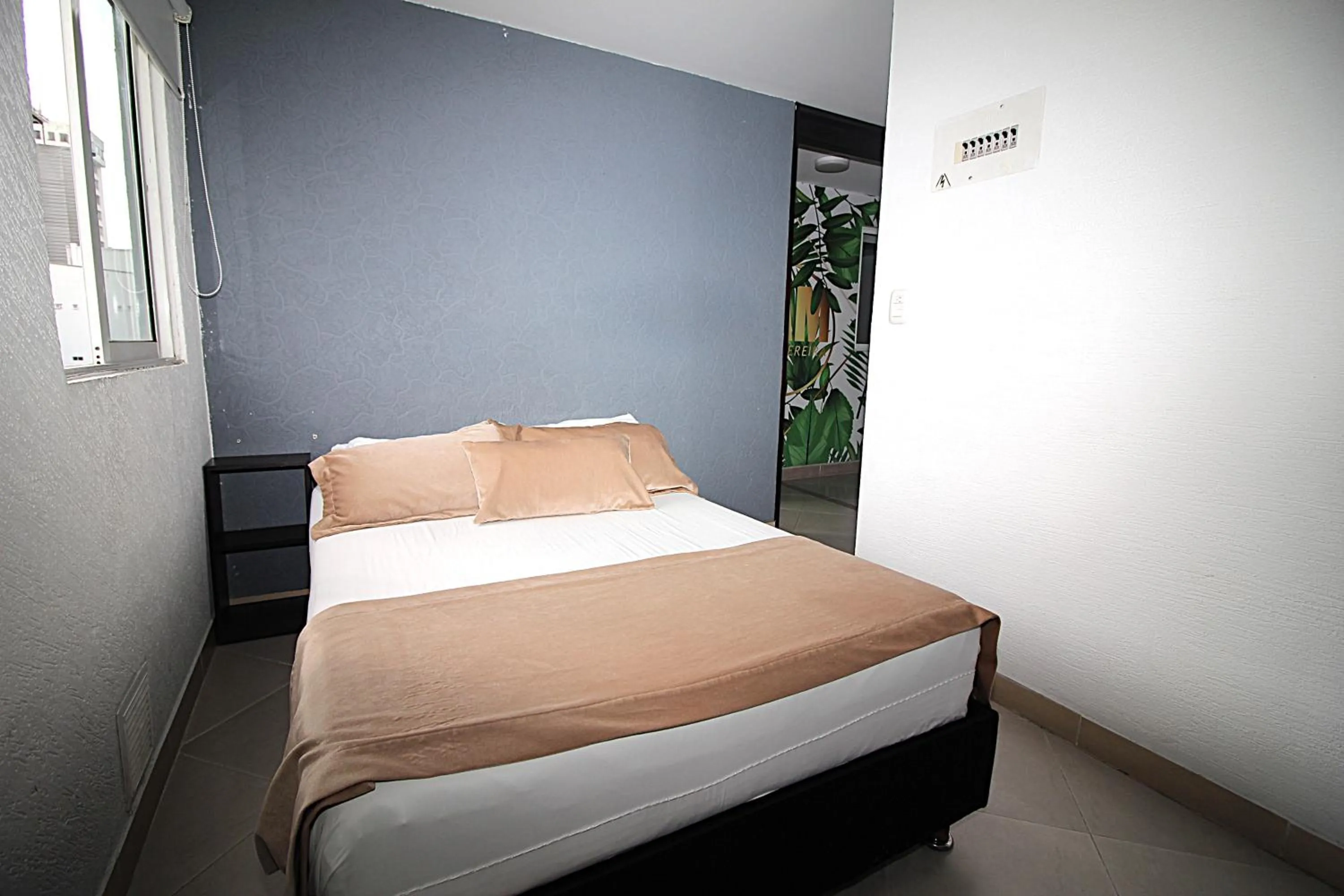 Bed in DAM Hotel Pereira