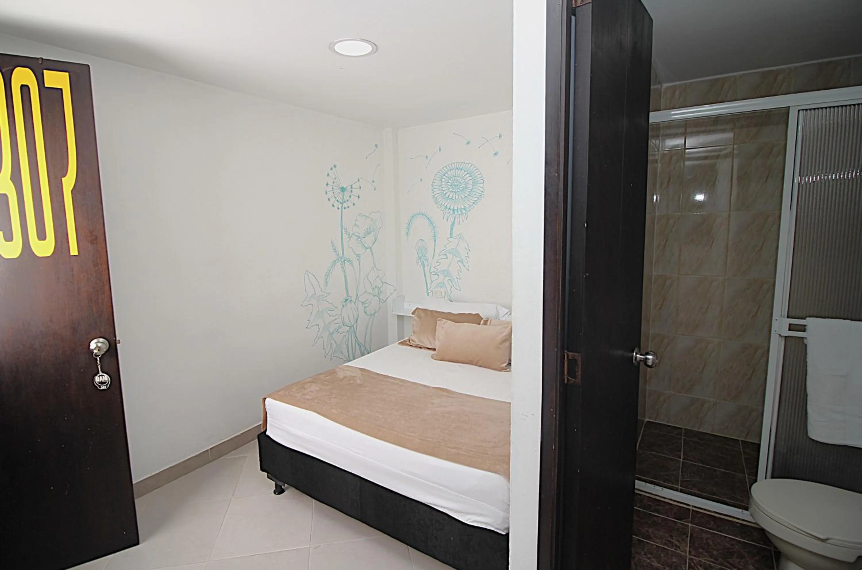 Photo of the whole room, Bed in DAM Hotel Pereira