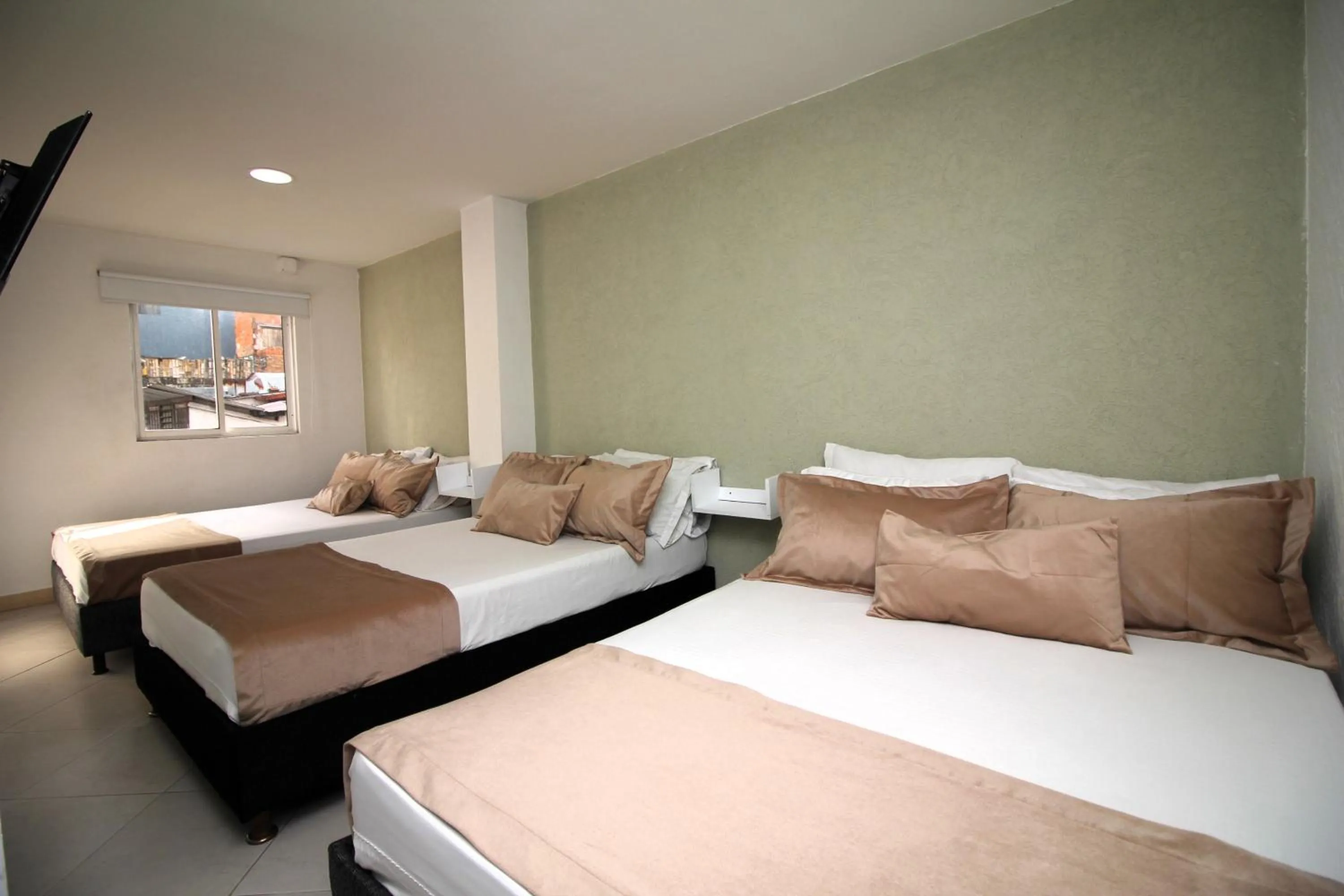 Bed in DAM Hotel Pereira