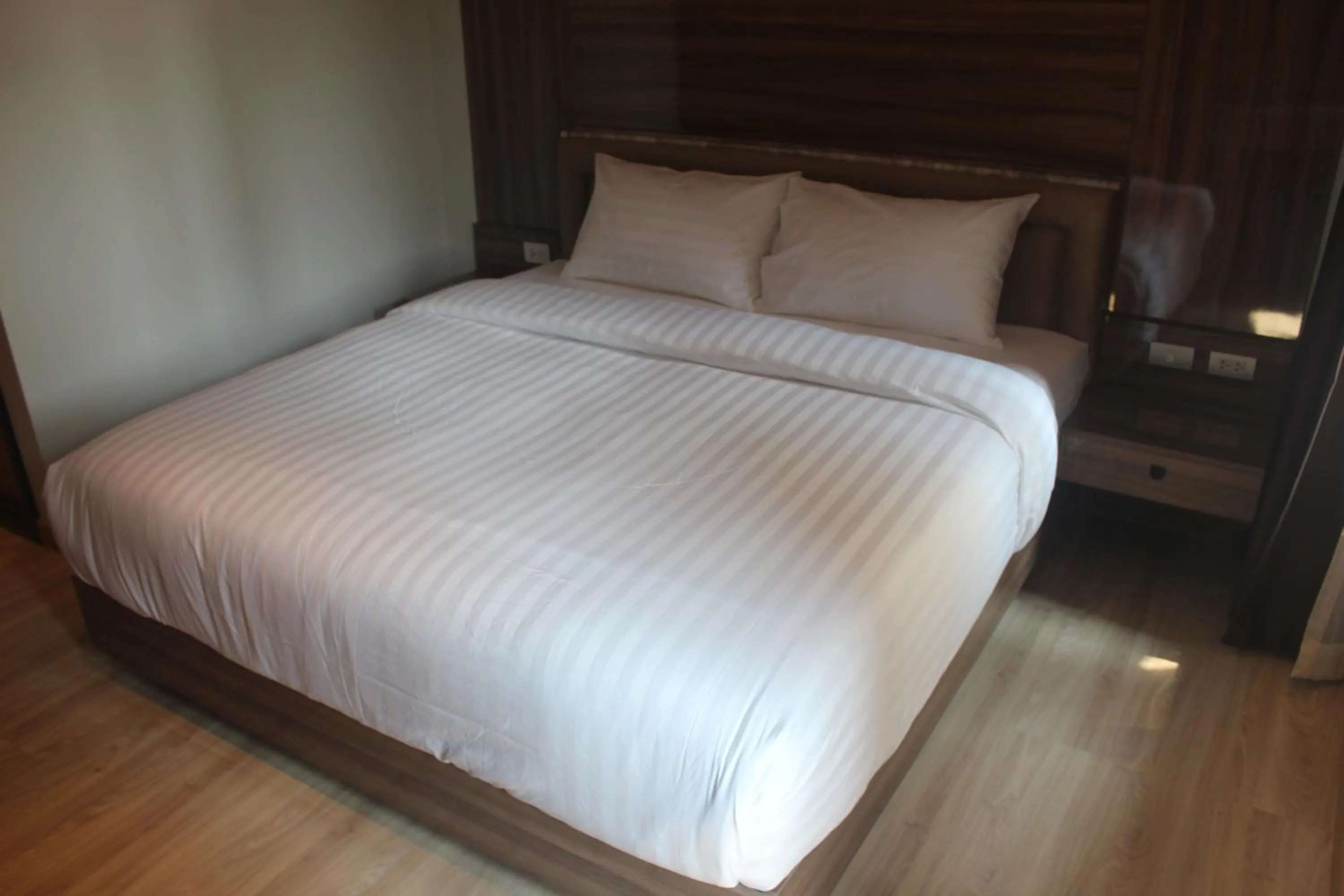 Bed in H-District Boutique Poshotel