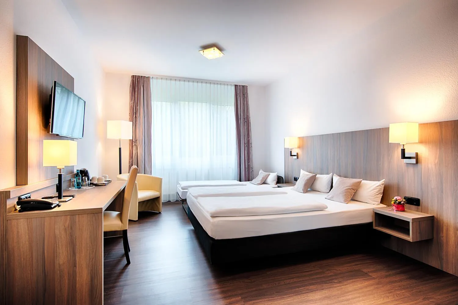 Bed in ACHAT Hotel Bochum Dortmund